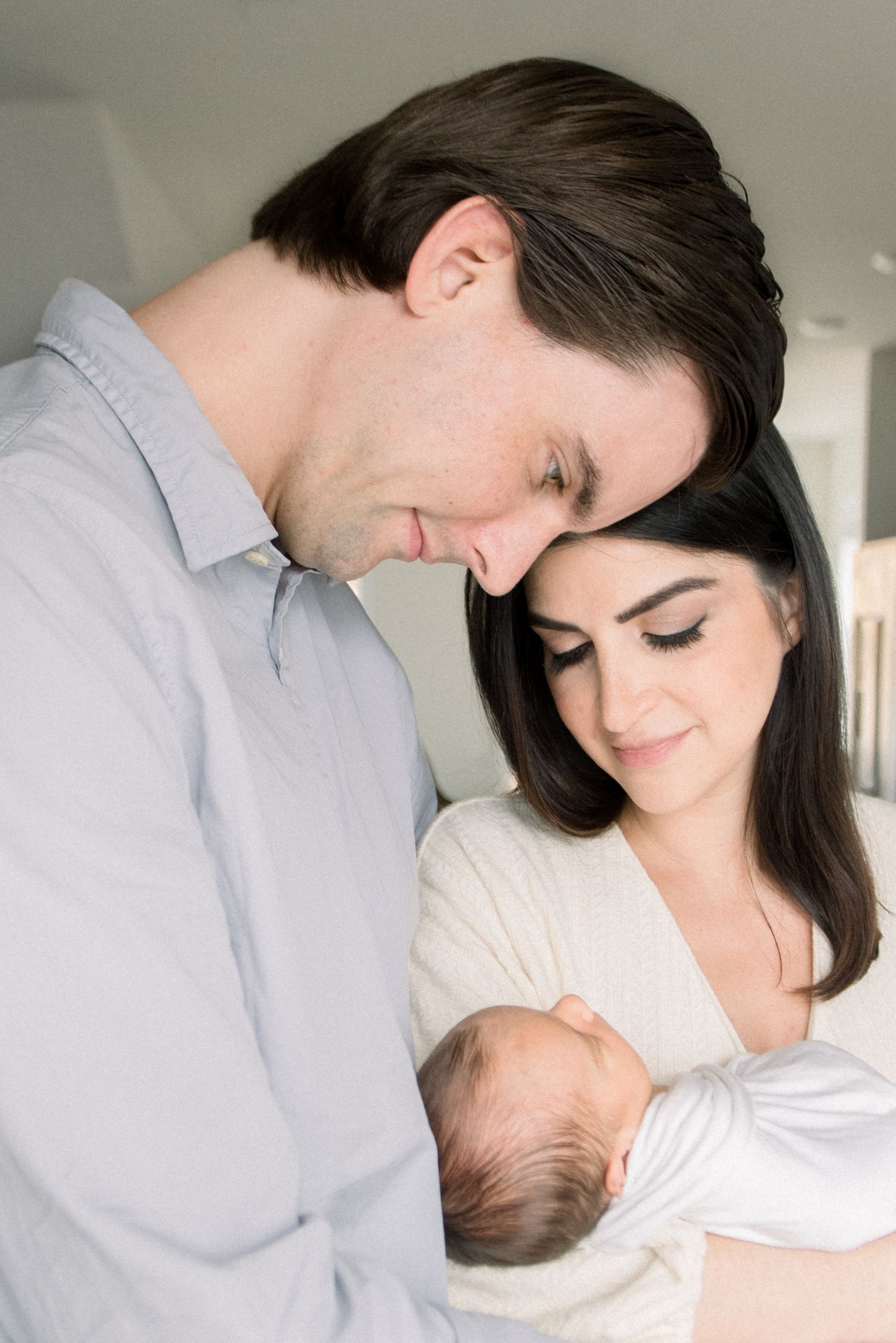 close up of mom and dad and newborn at washington dc newborn session