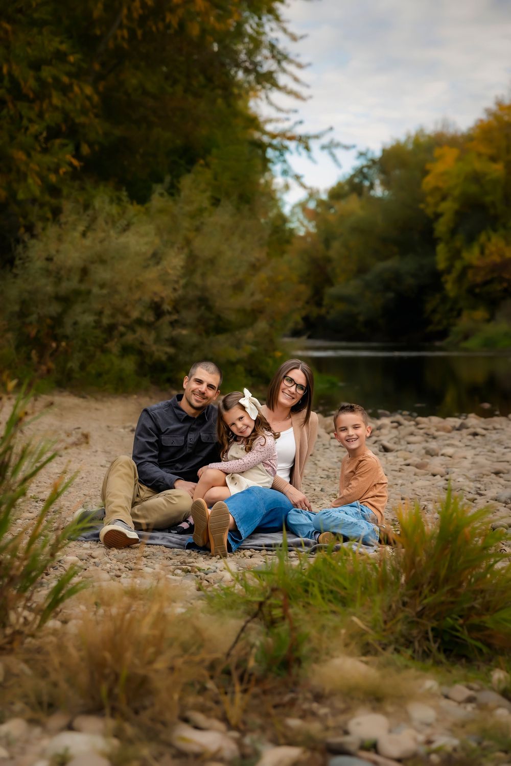 Autumn family photos at river bank