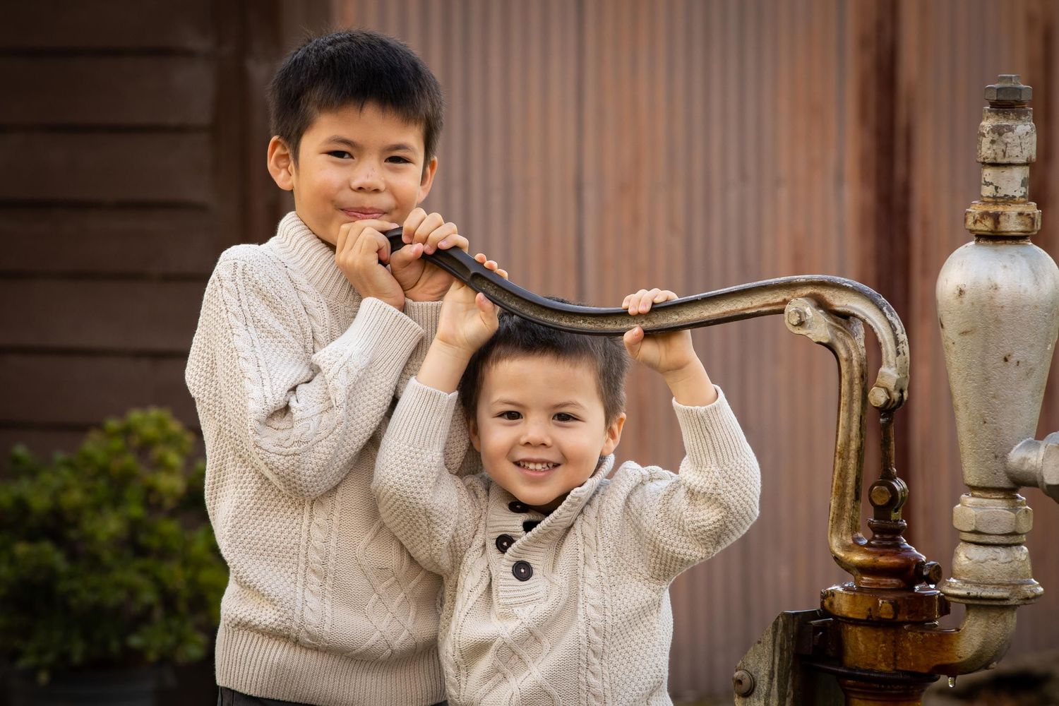 Young boys in Fagan Park playing with water