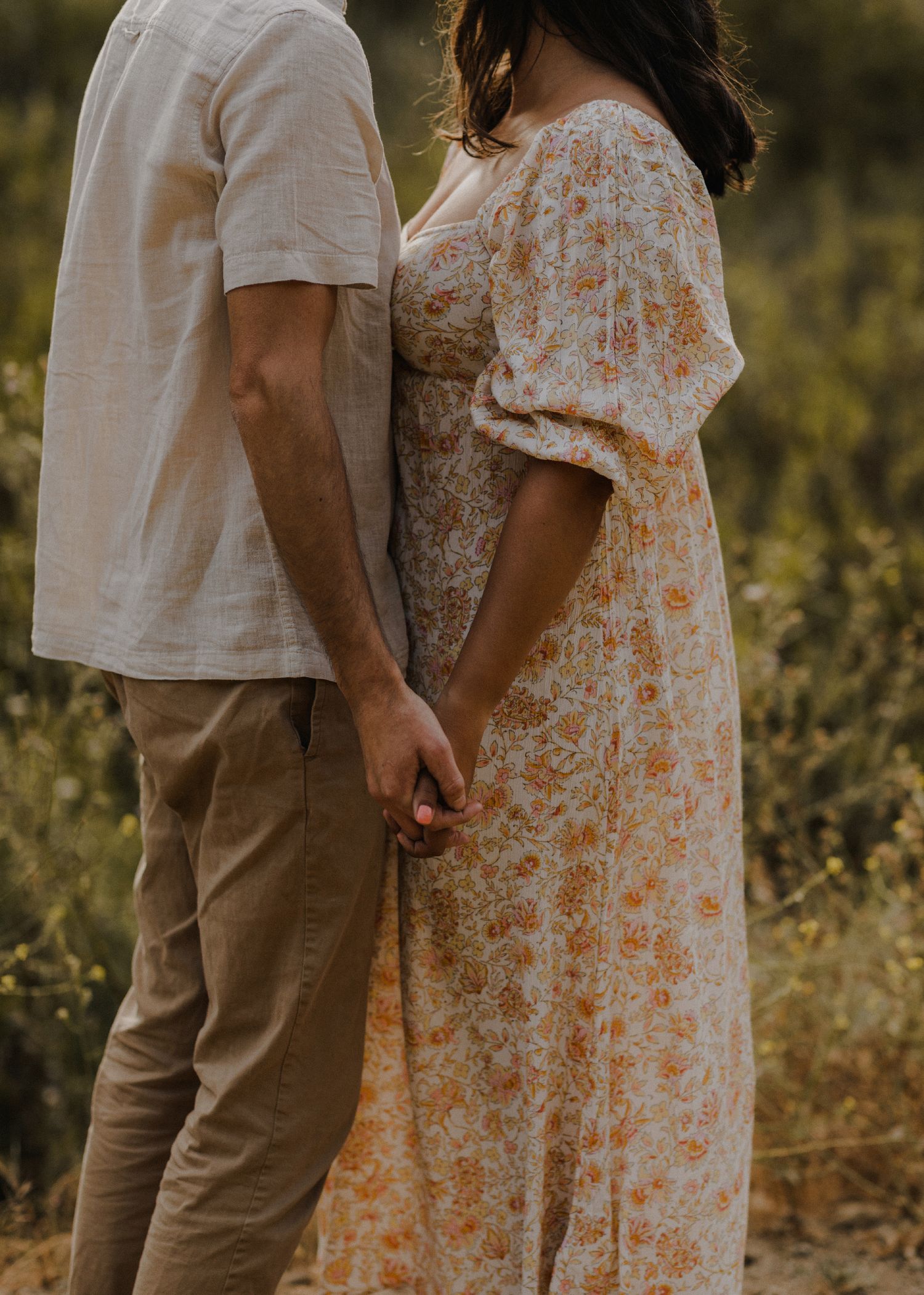 E. Noelle Photography couple engagement in the Los Angeles Malibu hills, people are holding hands cropped shot