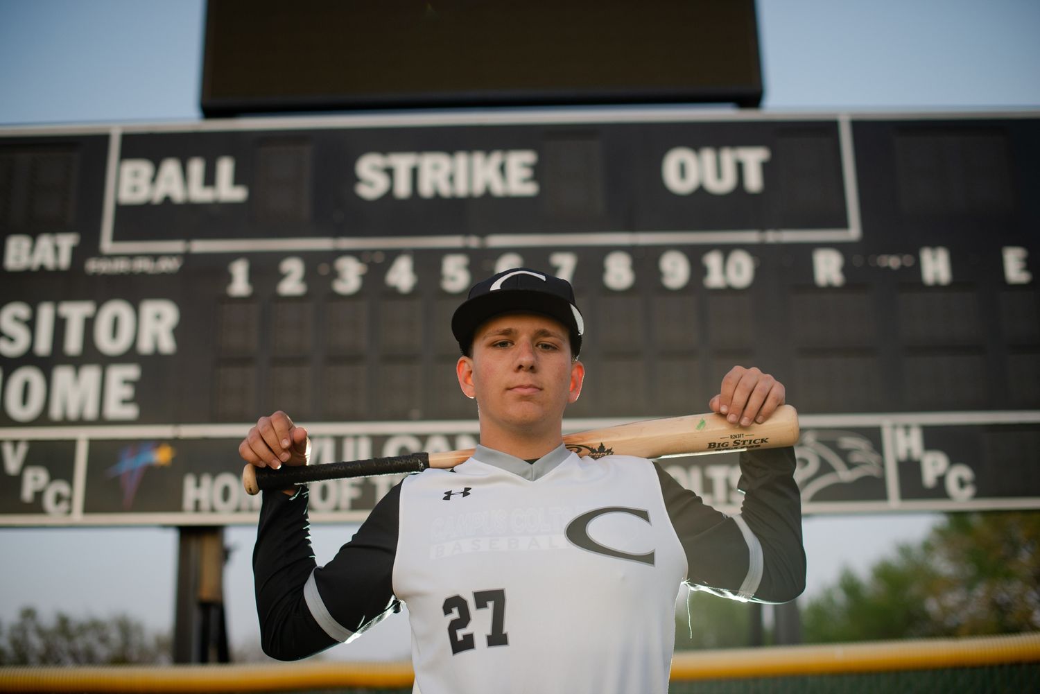 Campus Haysville high school senior pictures at baseball field - Derby, Wichita, KS photographer