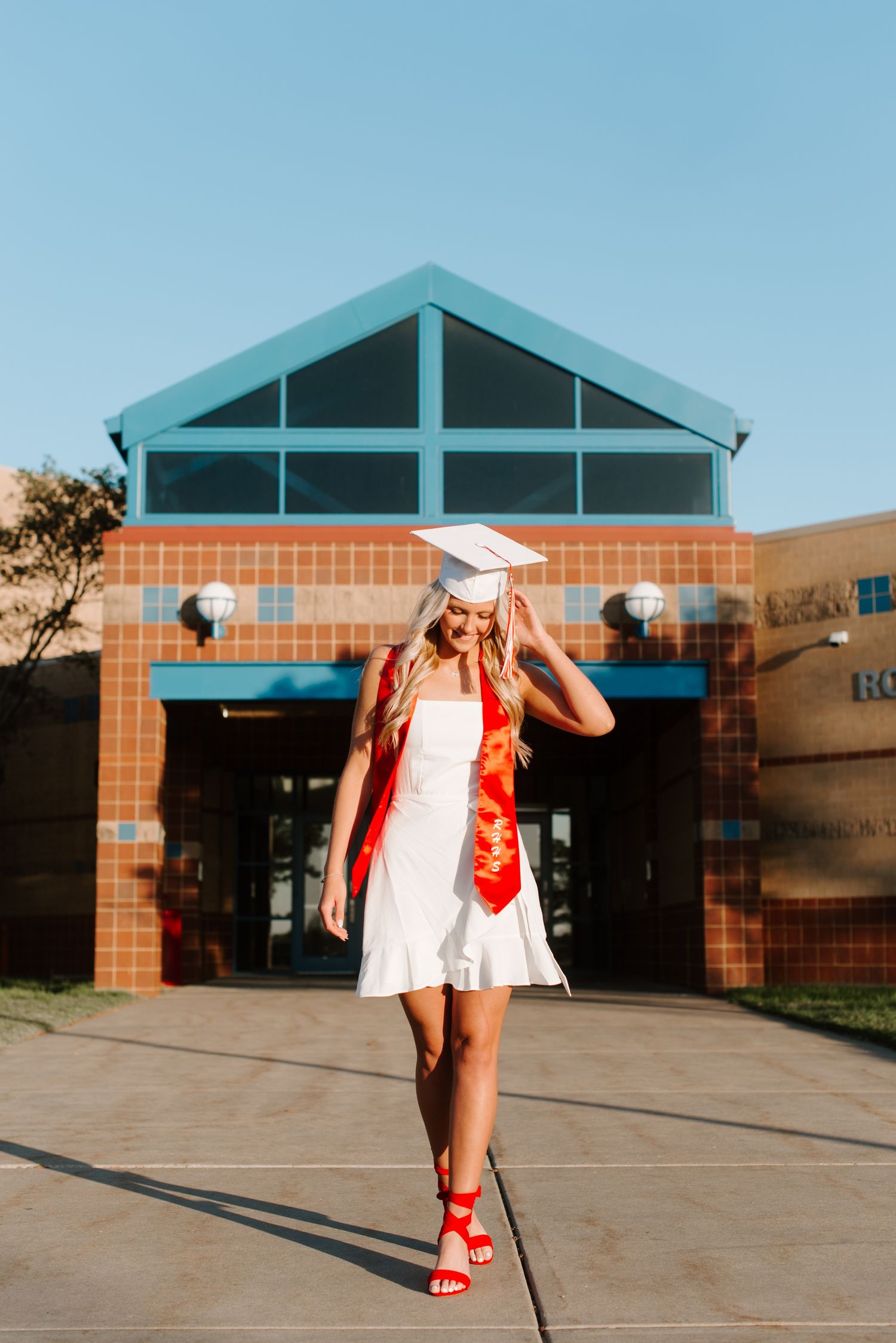 High school senior pictures with cap and gown at Rose Hill in Wichita KS Kansas