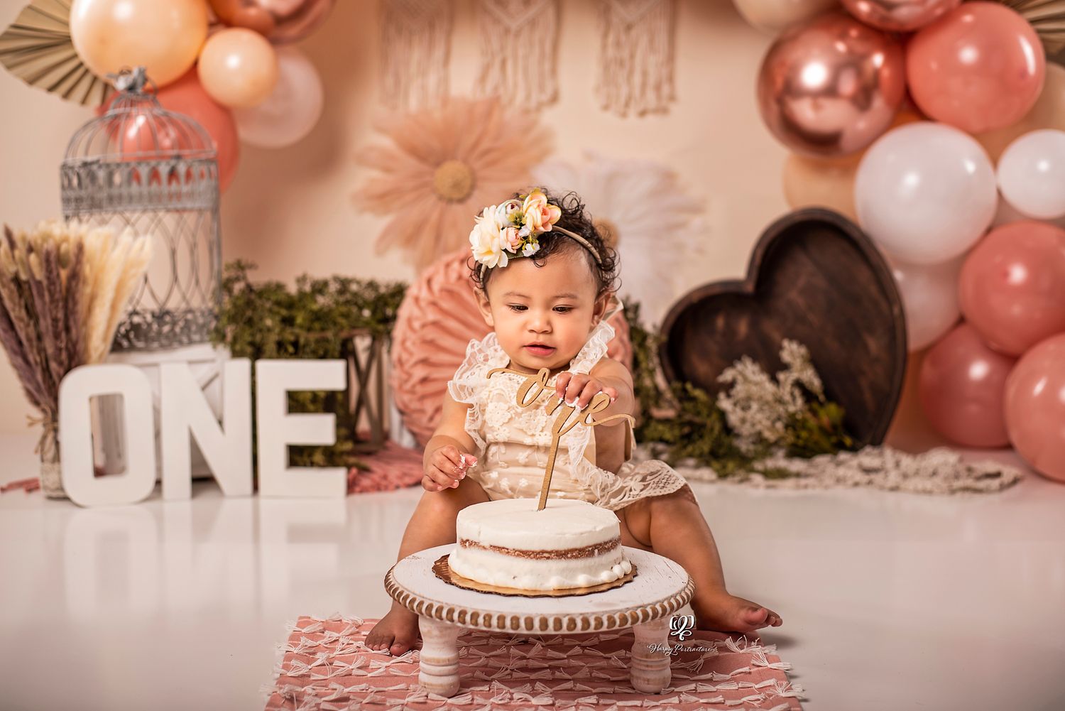 Cake Smash baby girl photoshoot; boho birthday photos; rose gold, pink, neutrals boho decor; baby girl first birthday