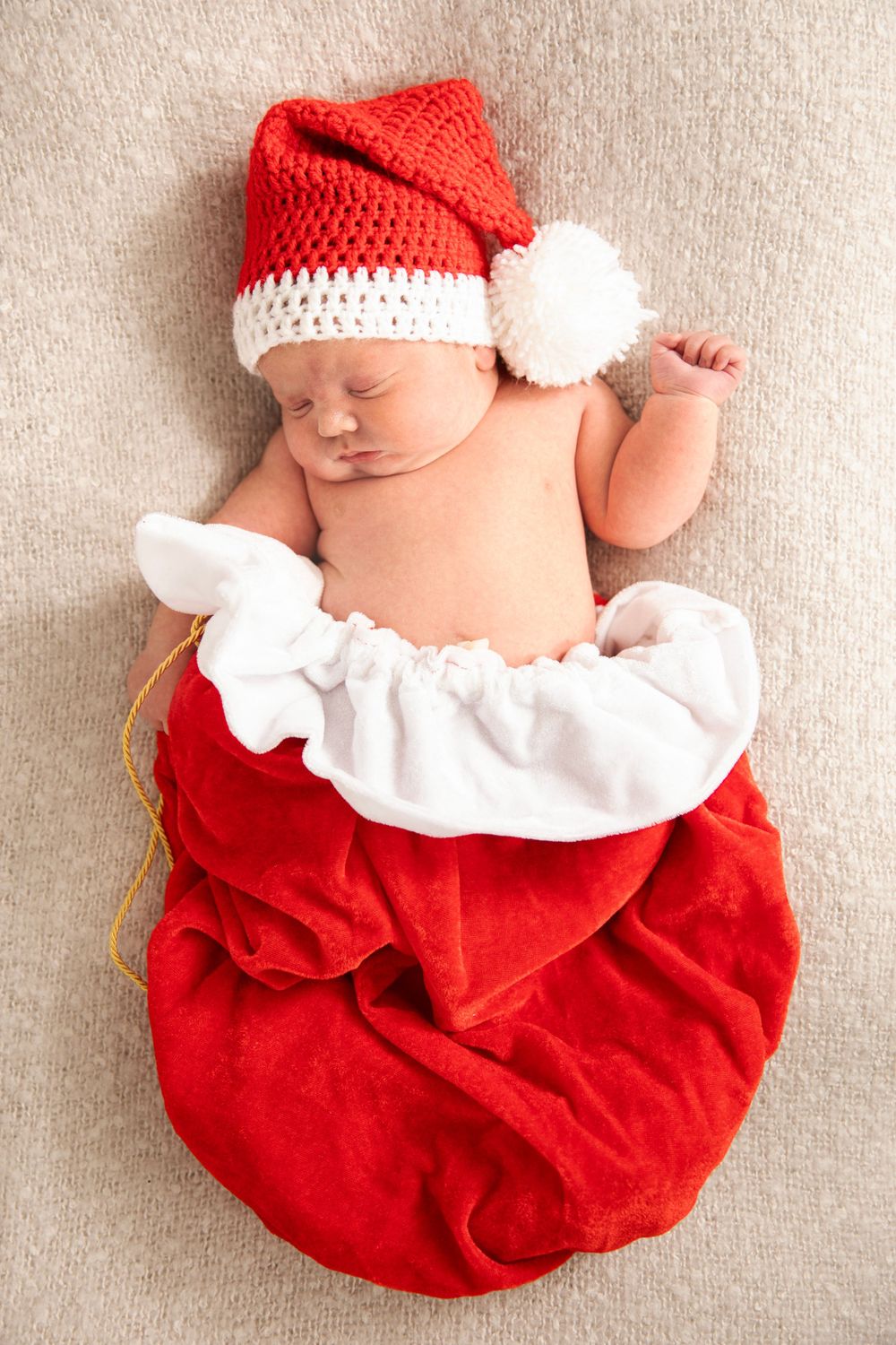 Christmas photo of newborn baby boy.