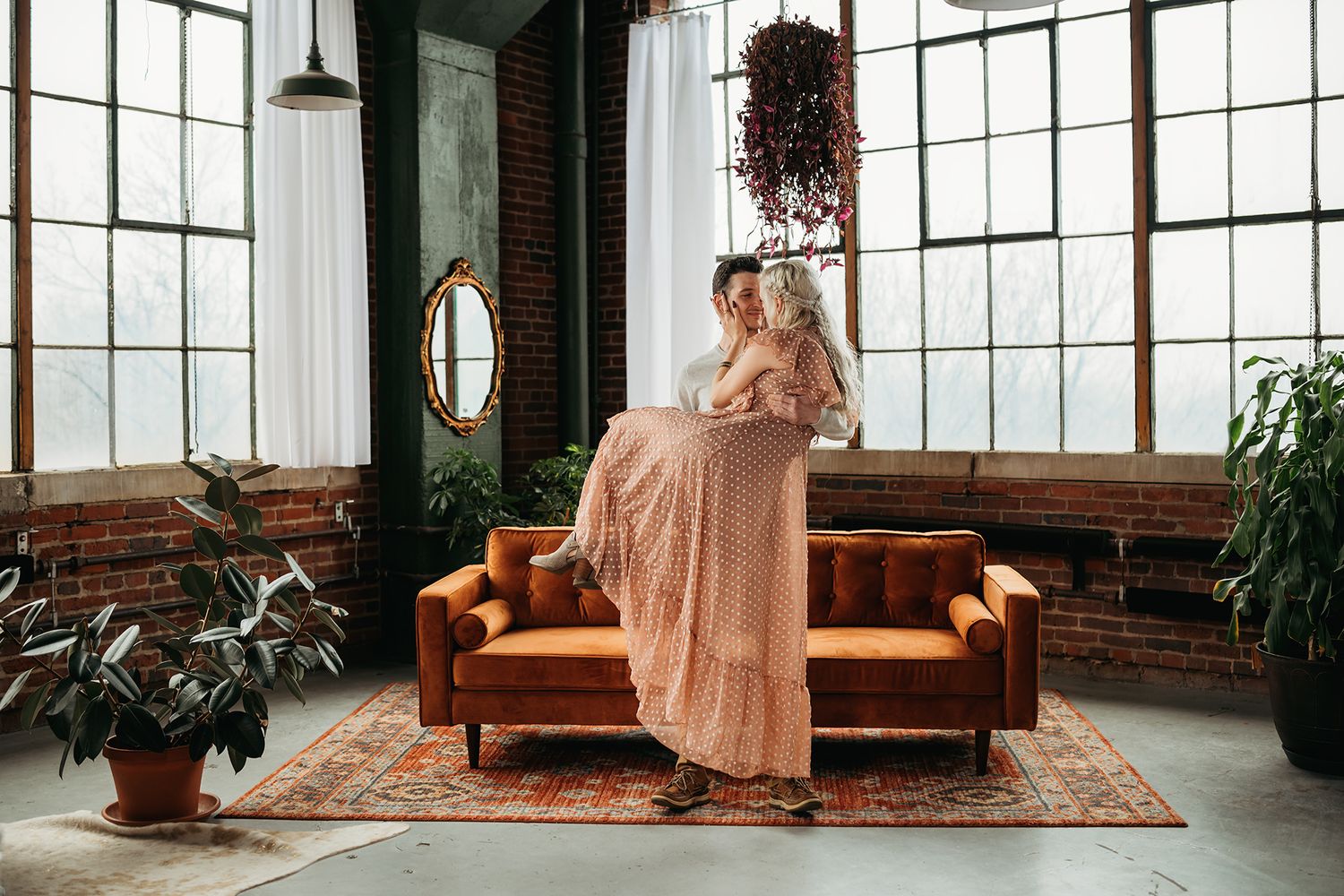 Engaged couple embracing in Akron Ohio captured by Jessica Hepp Photography
