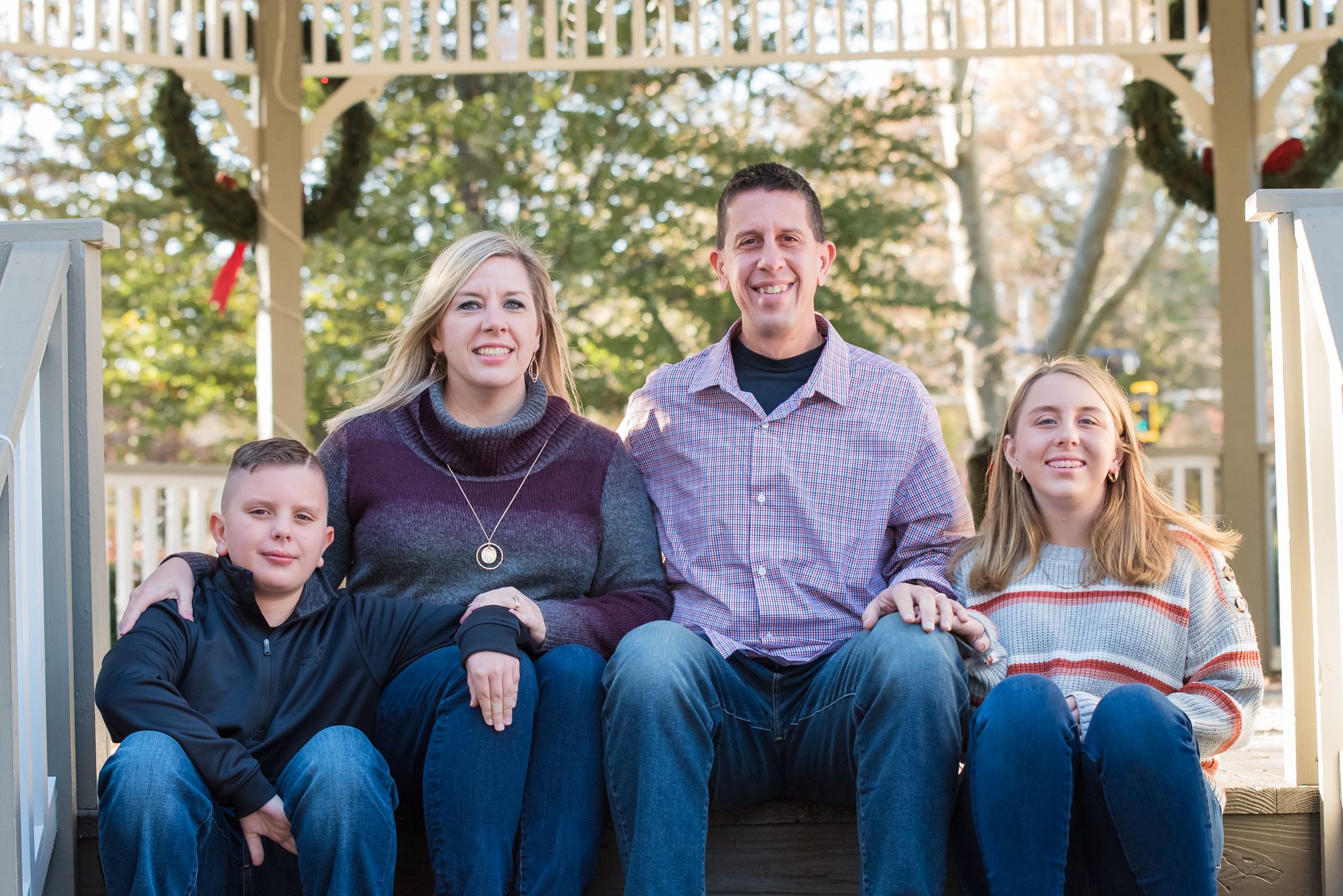 fall family picture with two kids in gazebo