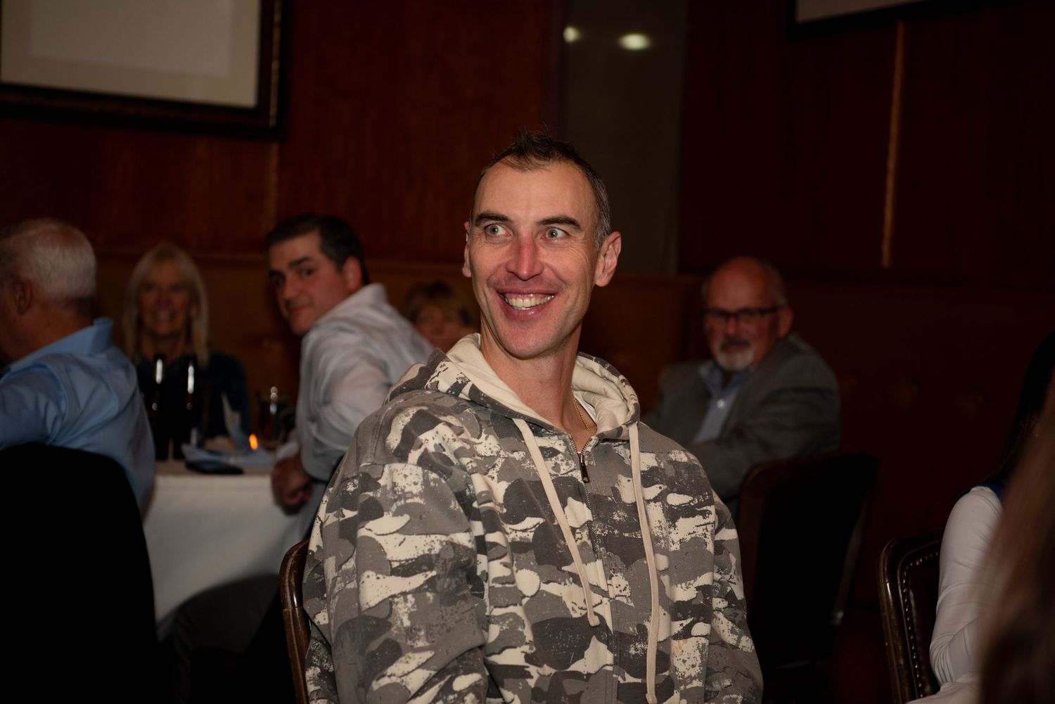 NHL Hall of Famer & Boston Bruin, Zdeno Chara smiles at Dinner for a Cause fundraiser in Watertown, MA. Event Photography by Leah Ramuglia.