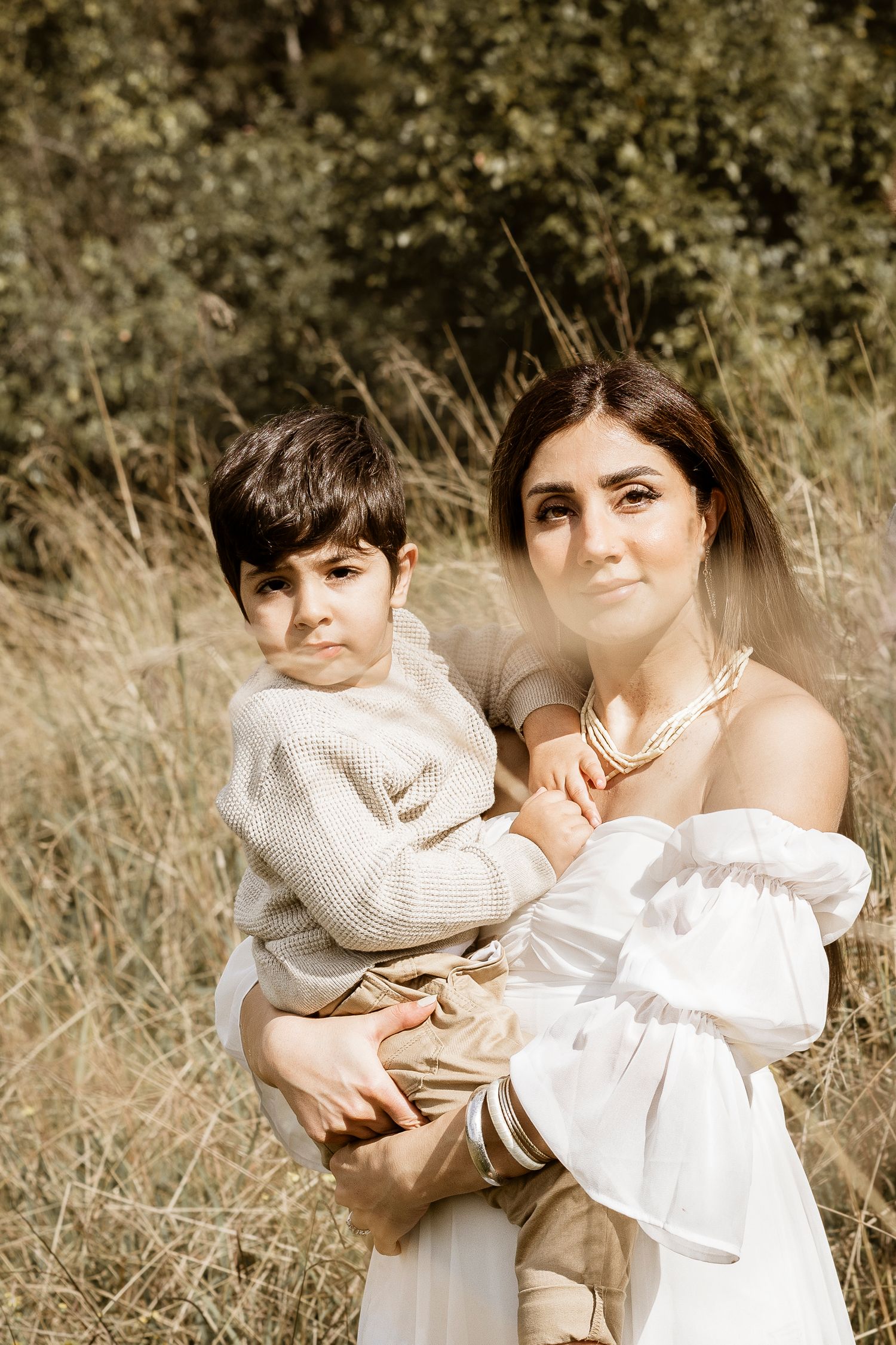 motherhood photography in a long grass field