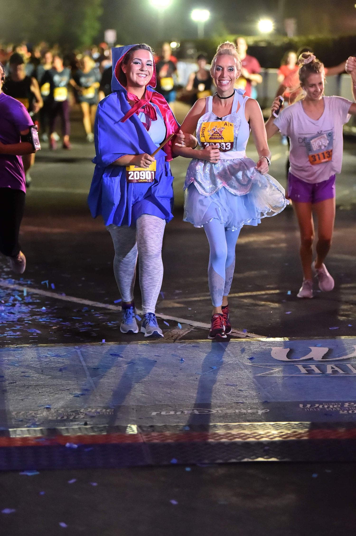 Laura & Kristyn dressed as Cinderella and her fairy godmother for RunDisney Race