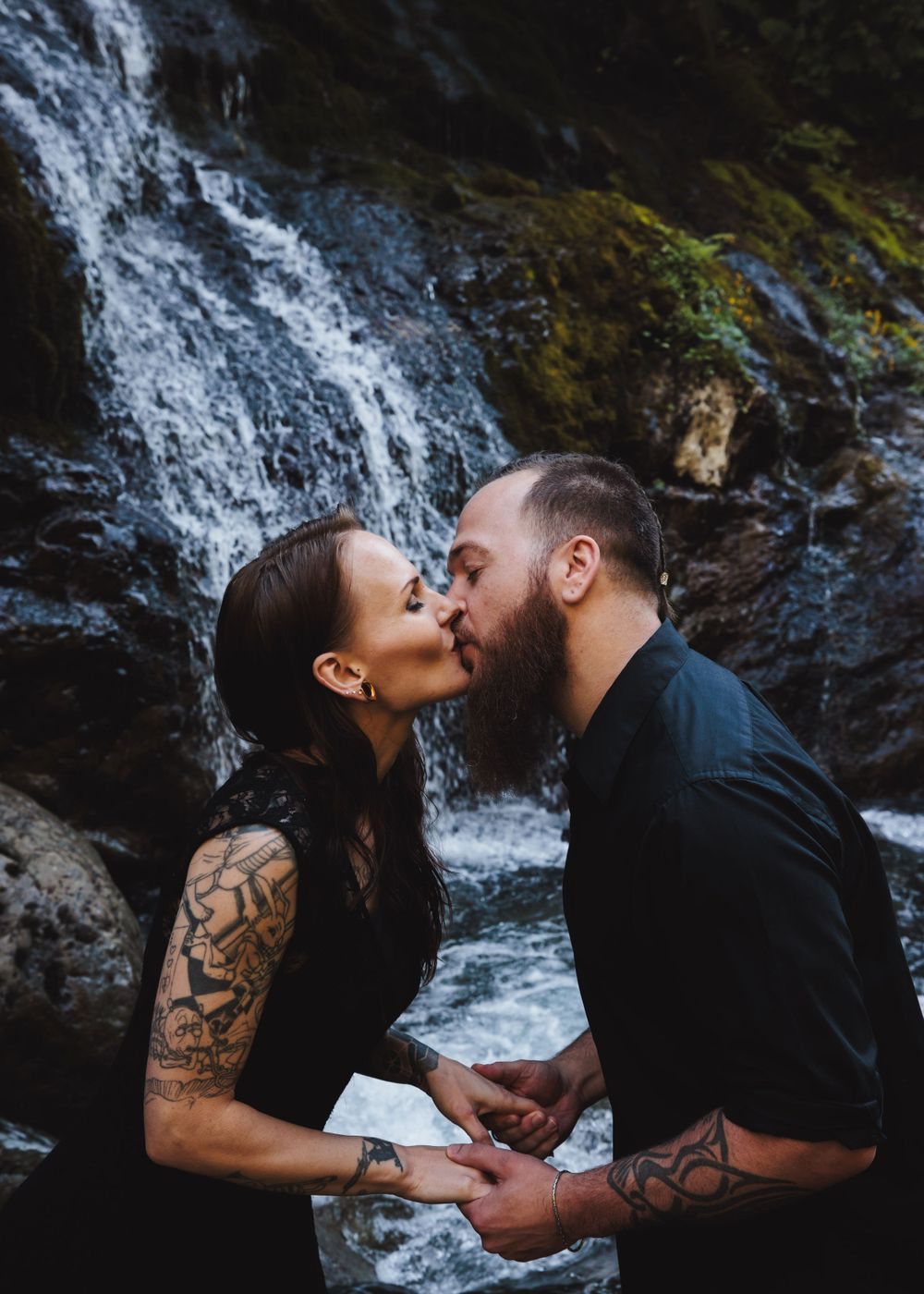 Close-up of a couple’s embrace during their Snohomish engagement. Tim Neal captures raw emotion.