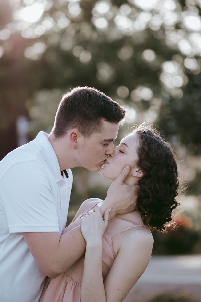 Close-up of a couple’s embrace during their Snohomish engagement. Tim Neal captures raw emotion.