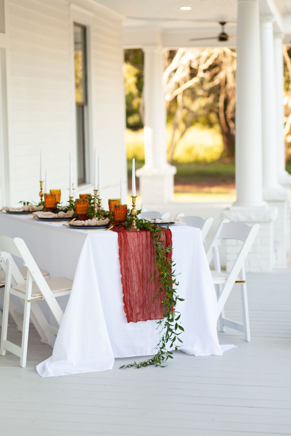 A LP Planning and Design decorated front porch at the House on Barber Mill in Clayton, NC.