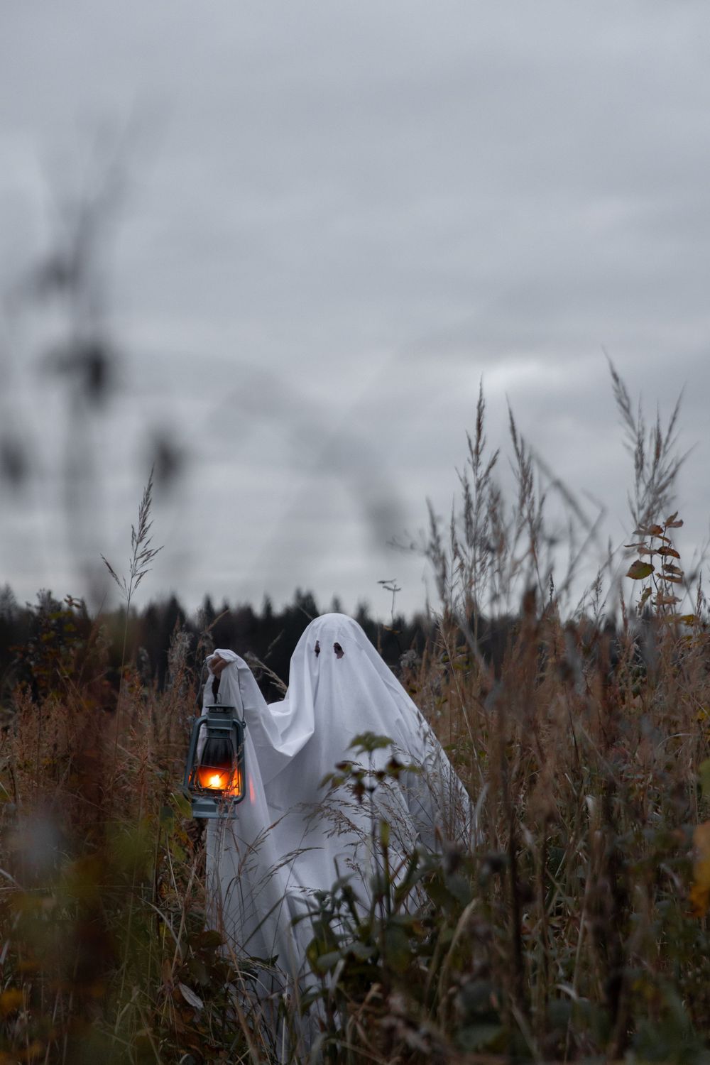 Strongshot Studio, Martinez, GA, Creative Photography, halloween ghost holding a lantern outdoors.