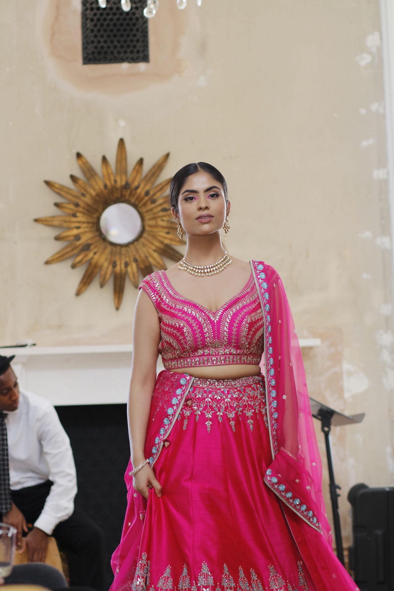 Stunning pink lehenga with intricate silver embroidery and matching dupatta.
