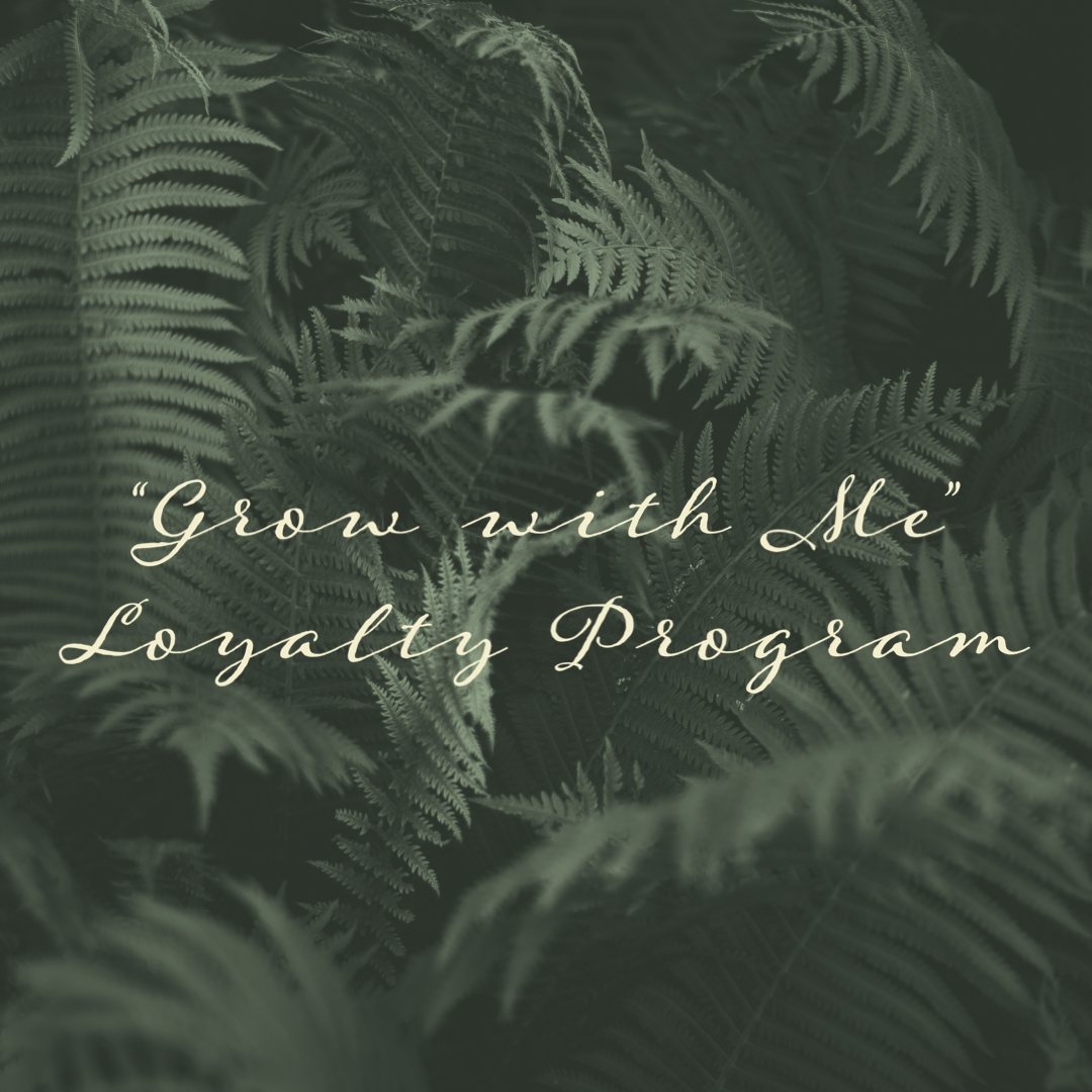 Ethereal fern leaves in dark tones with cursive text reading Grow with Me Loyalty Program.