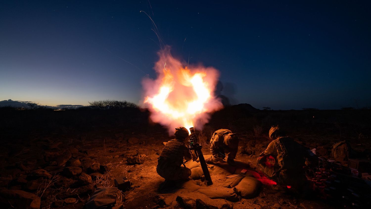 Mortar team firing at night in Kenya