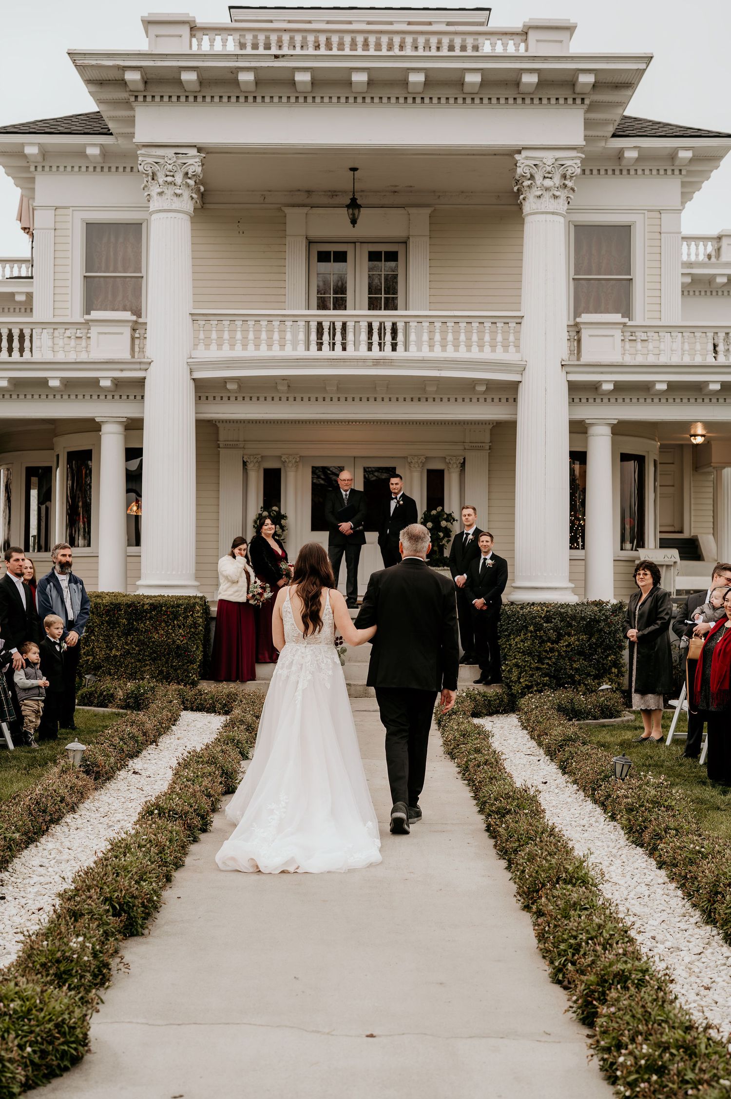 bride and father walking down the aisle