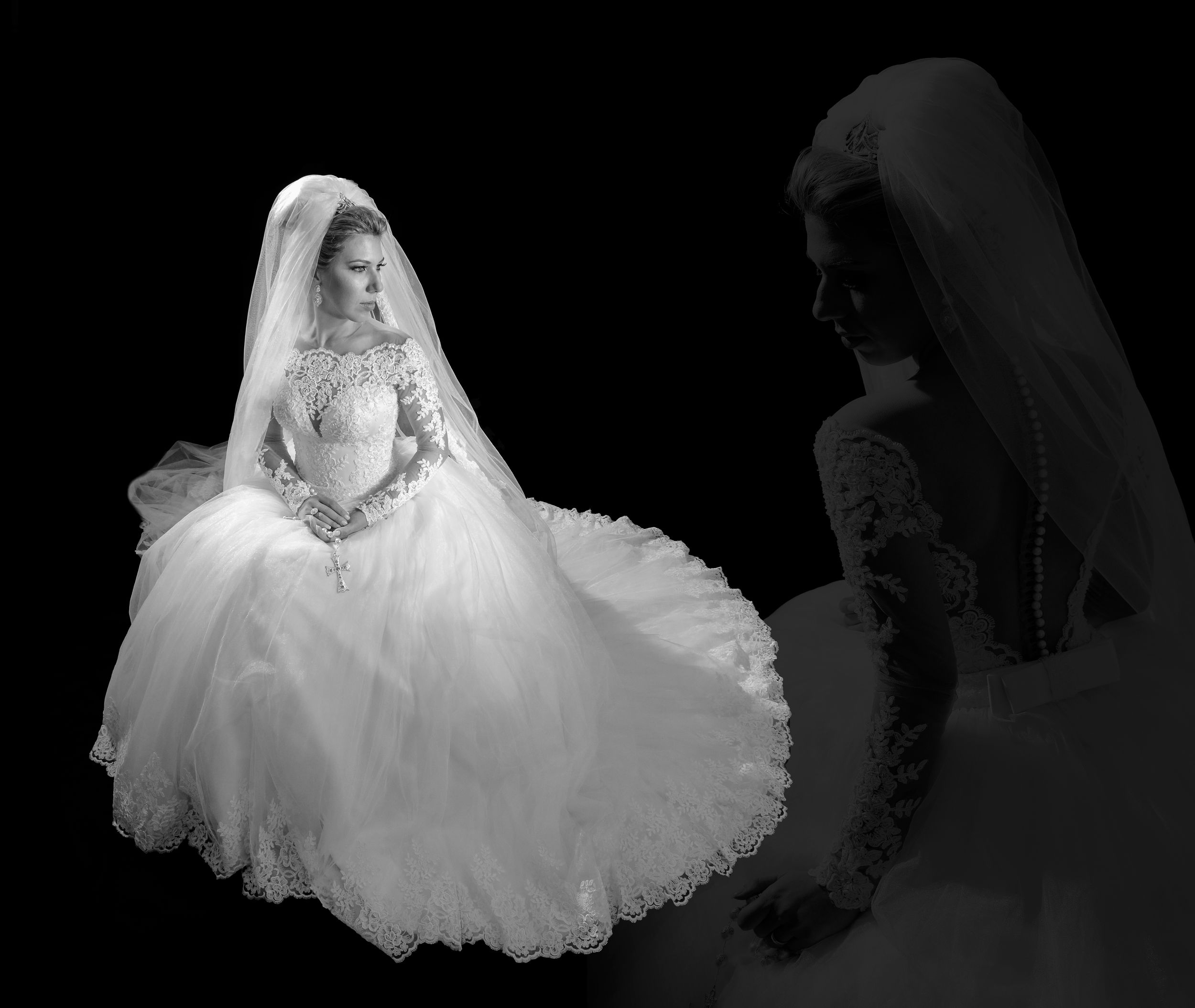 Elegant bridal portraits showcasing flowing white wedding gown details in dramatic lighting.