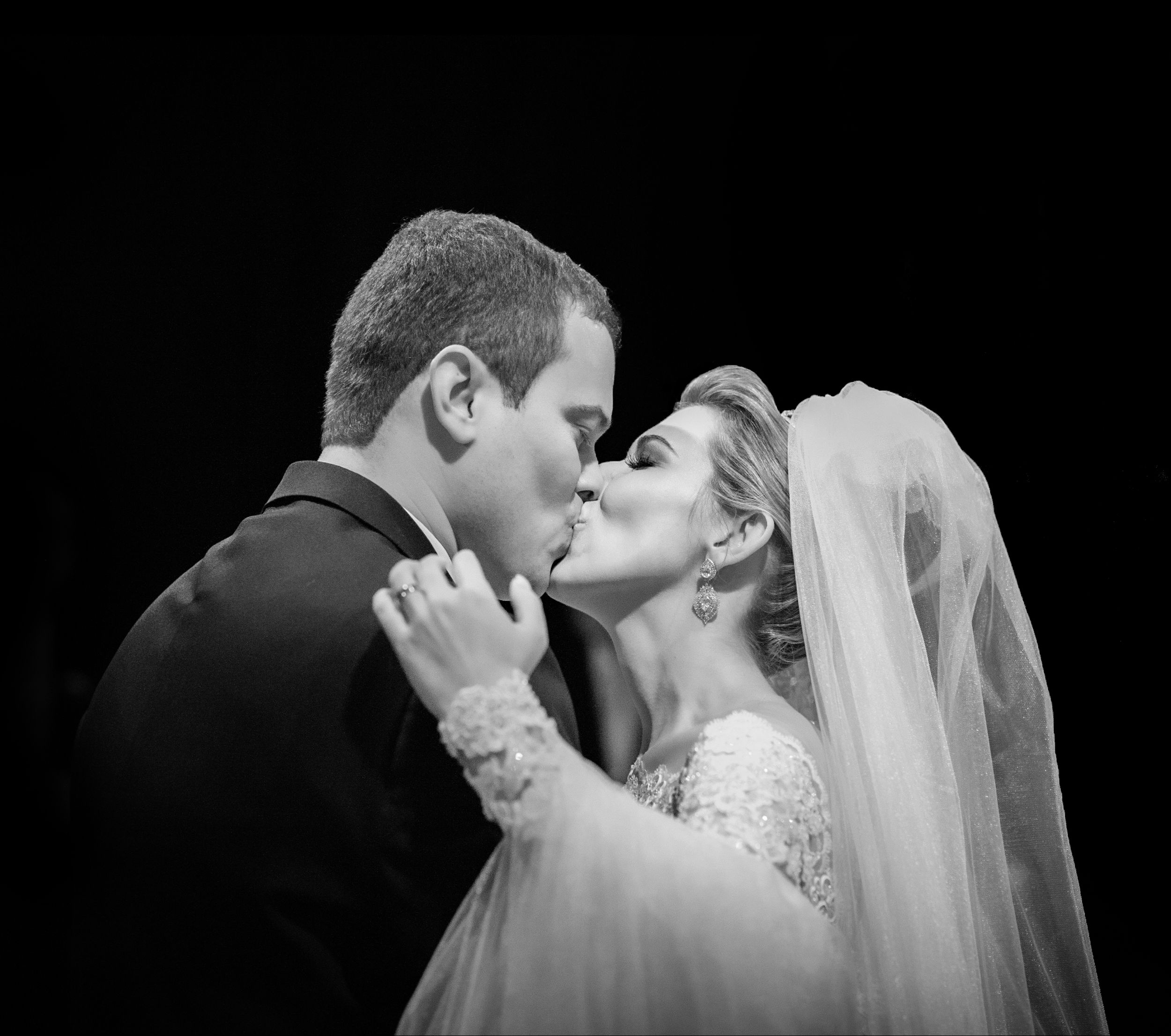 Intimate black and white wedding portrait sequence showing tender moments.
