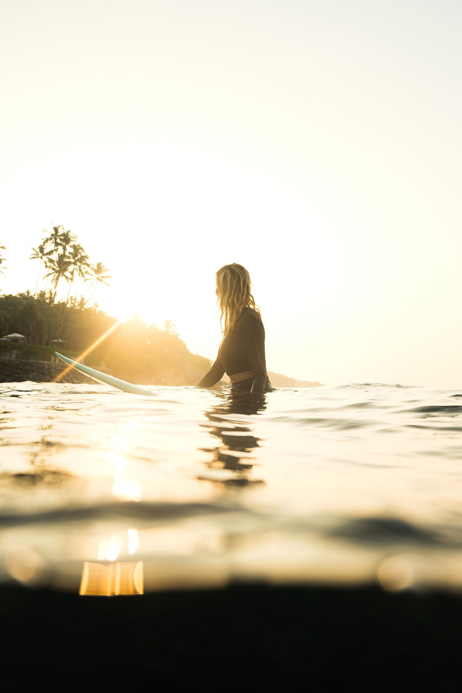 surf pictures of people surfing in water with underwaterhousing photographer