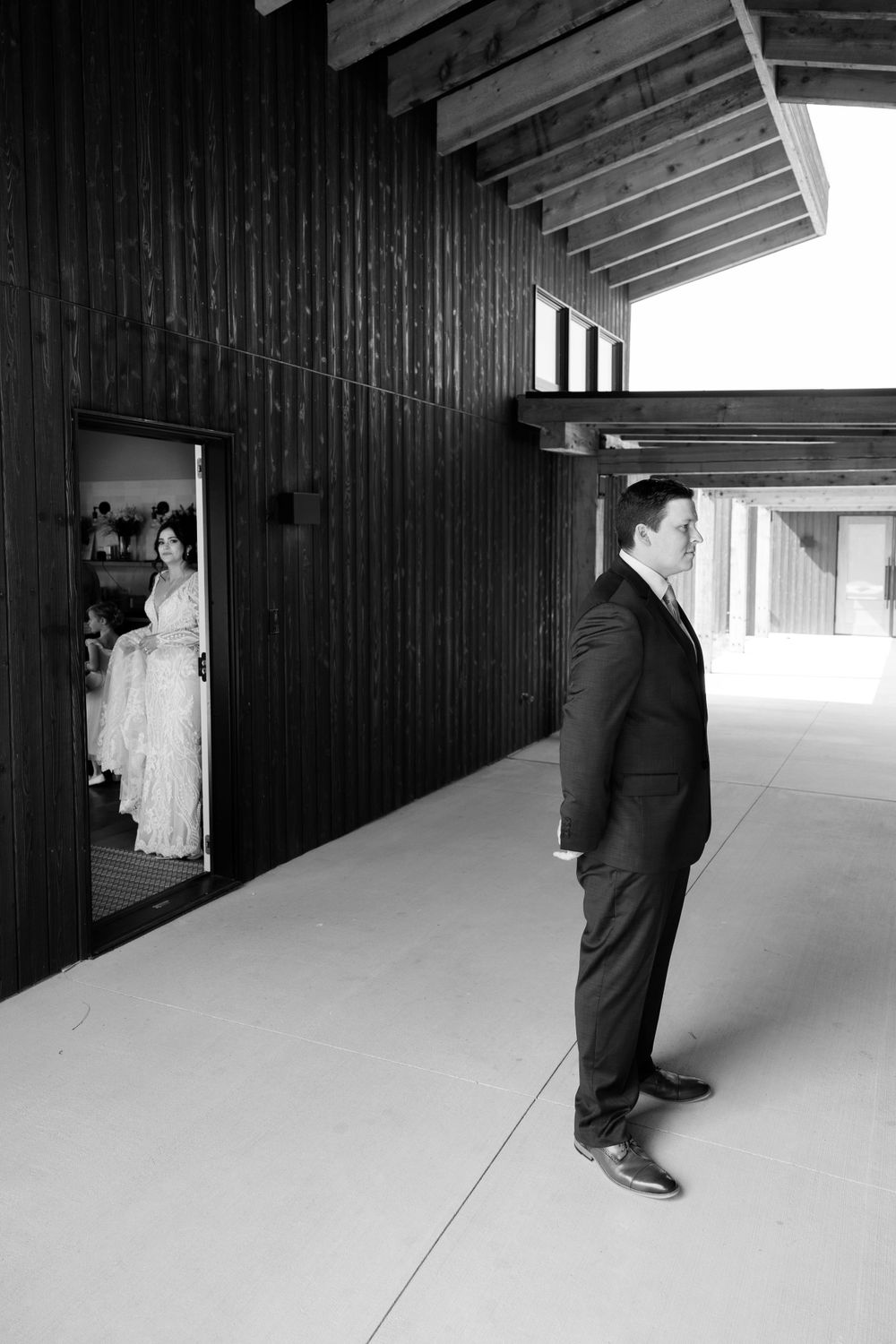 Moments before bride and groom's first look on wedding day at Jorgensen Farms in Westerville, Ohio.