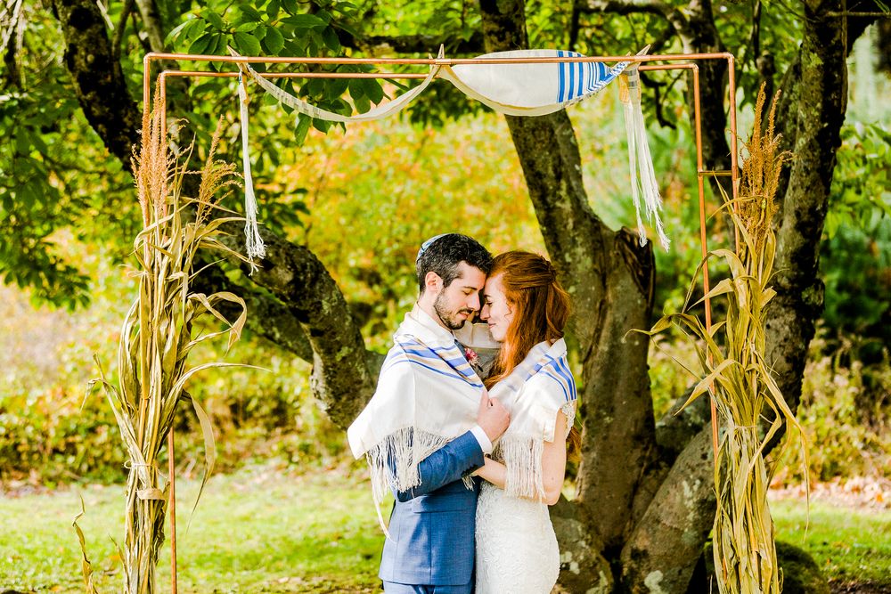 bride and groom during jewish wedding ceremony