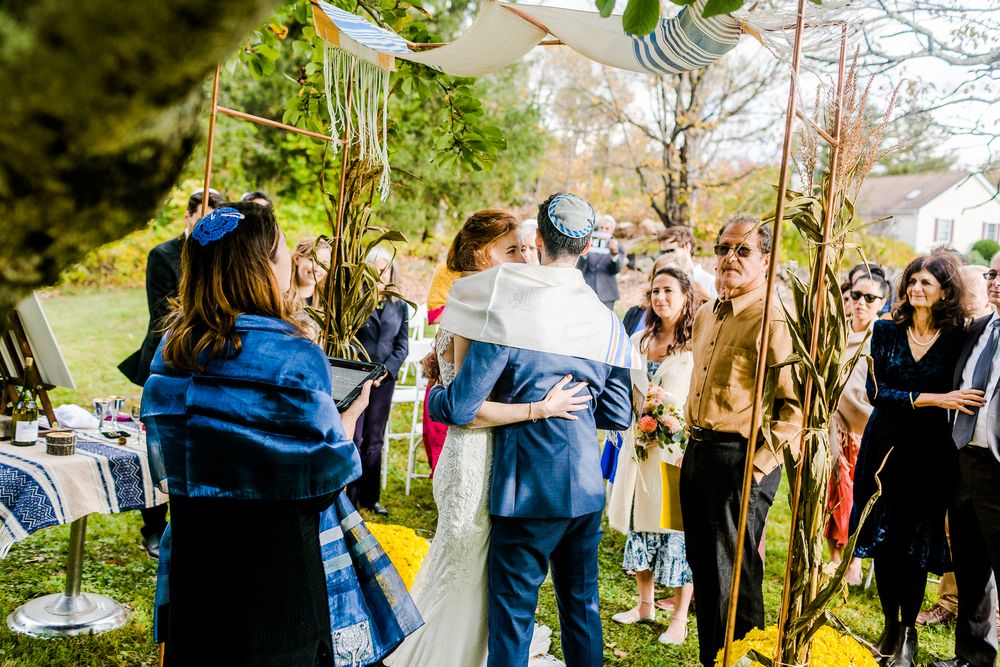 bride and groom during jewish wedding ceremony