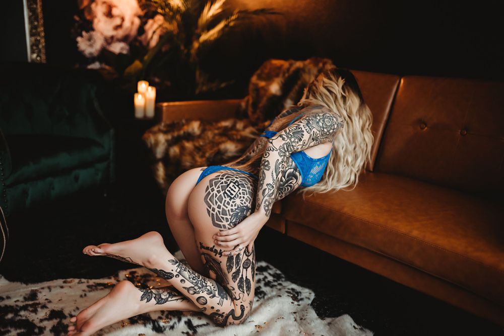 Empowered woman in elegant lingerie during a boudoir session in Indianapolis with Alicia Miller.
