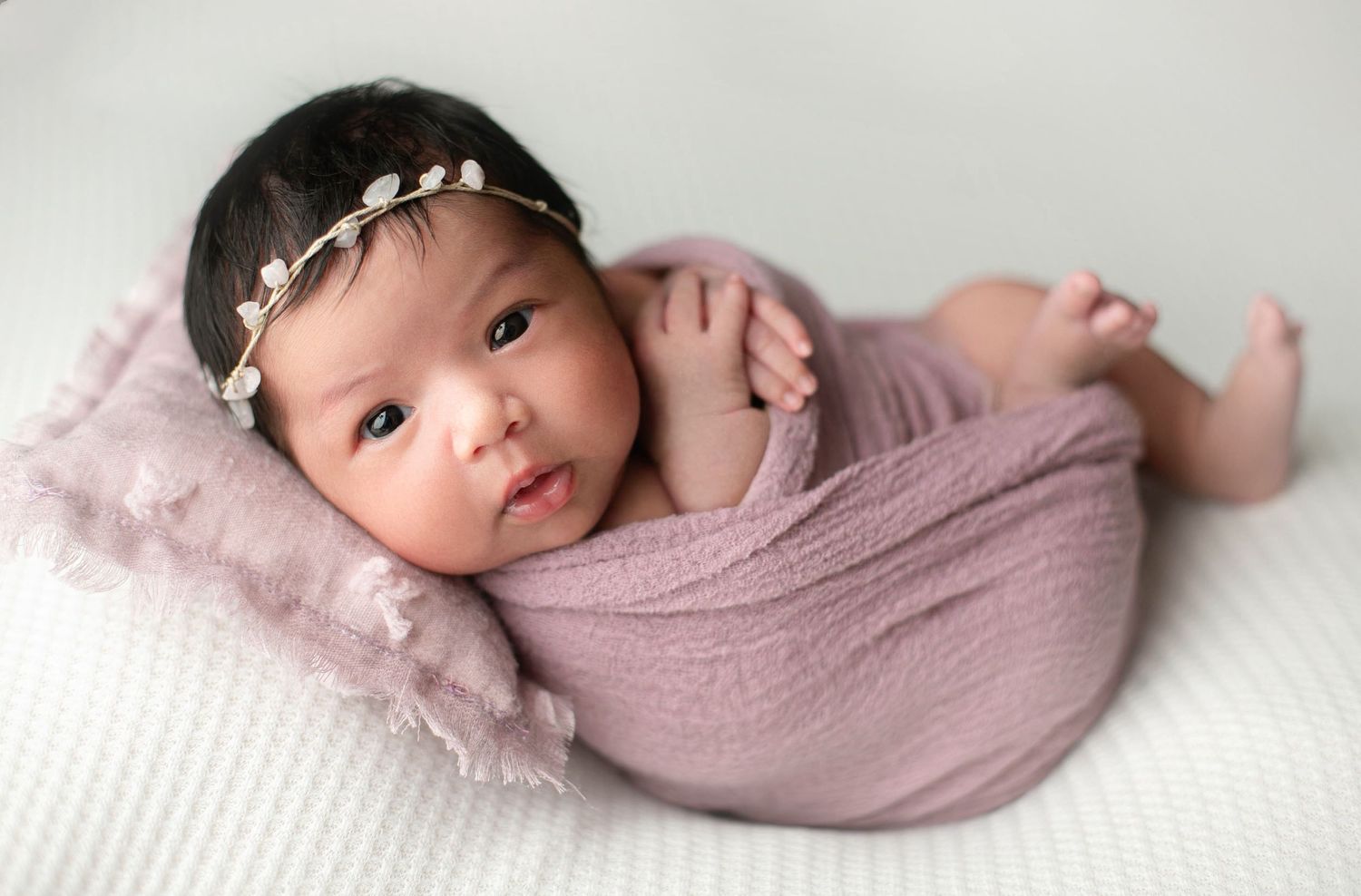 Beautiful Newborn baby girl wrapped in a soft purple wrap and a soft purple bonnet. - Greenville SC photographer - Easley SC photographer