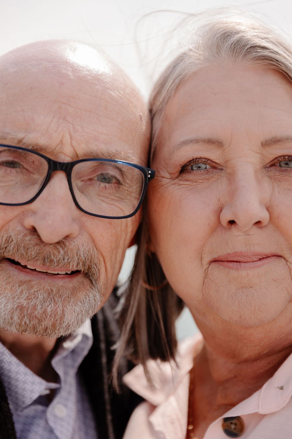 An older couple posing for a photo.