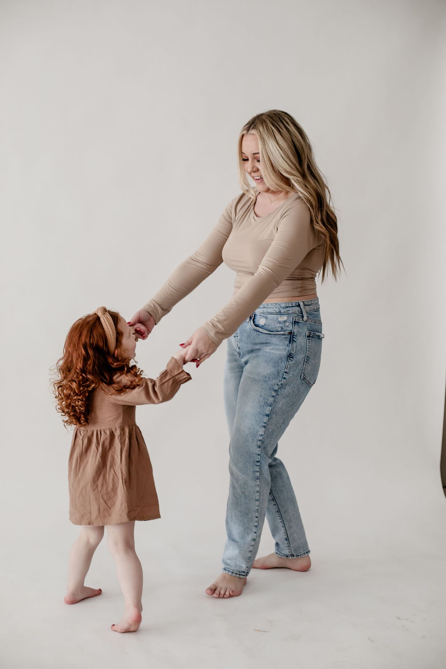 Playful dancing and twirling captured in a series of natural lifestyle photos.