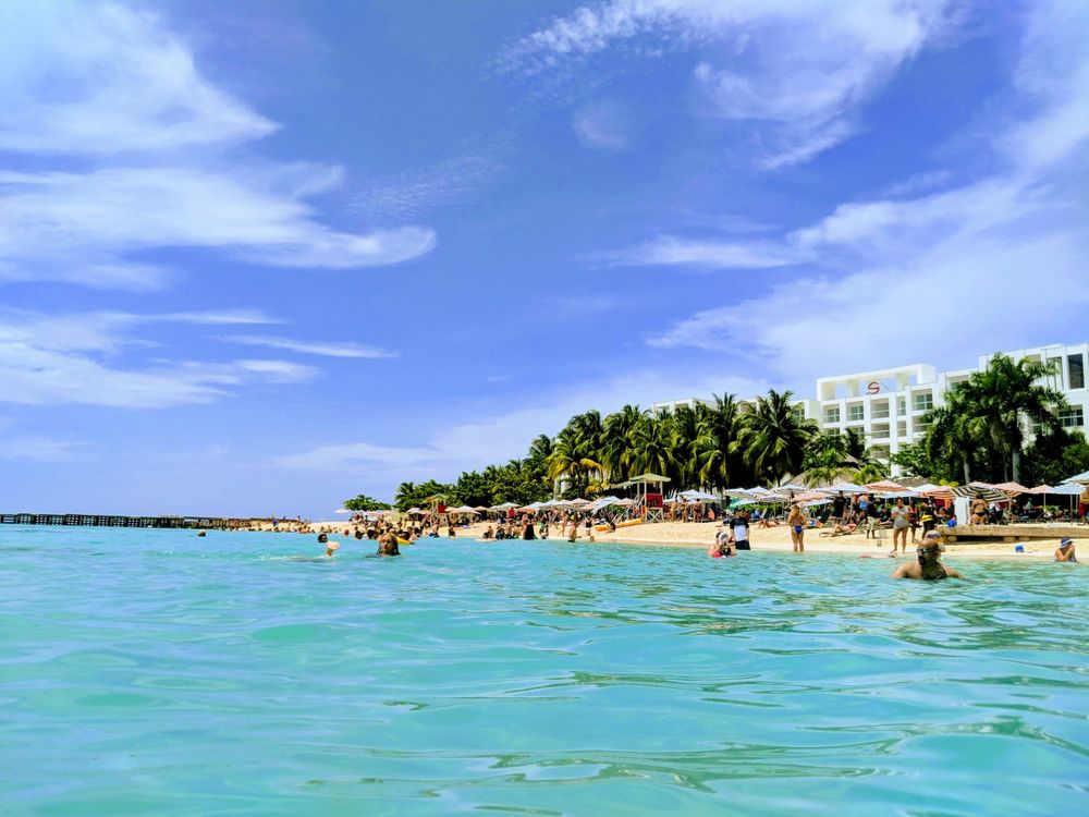 a beach with blue Skys