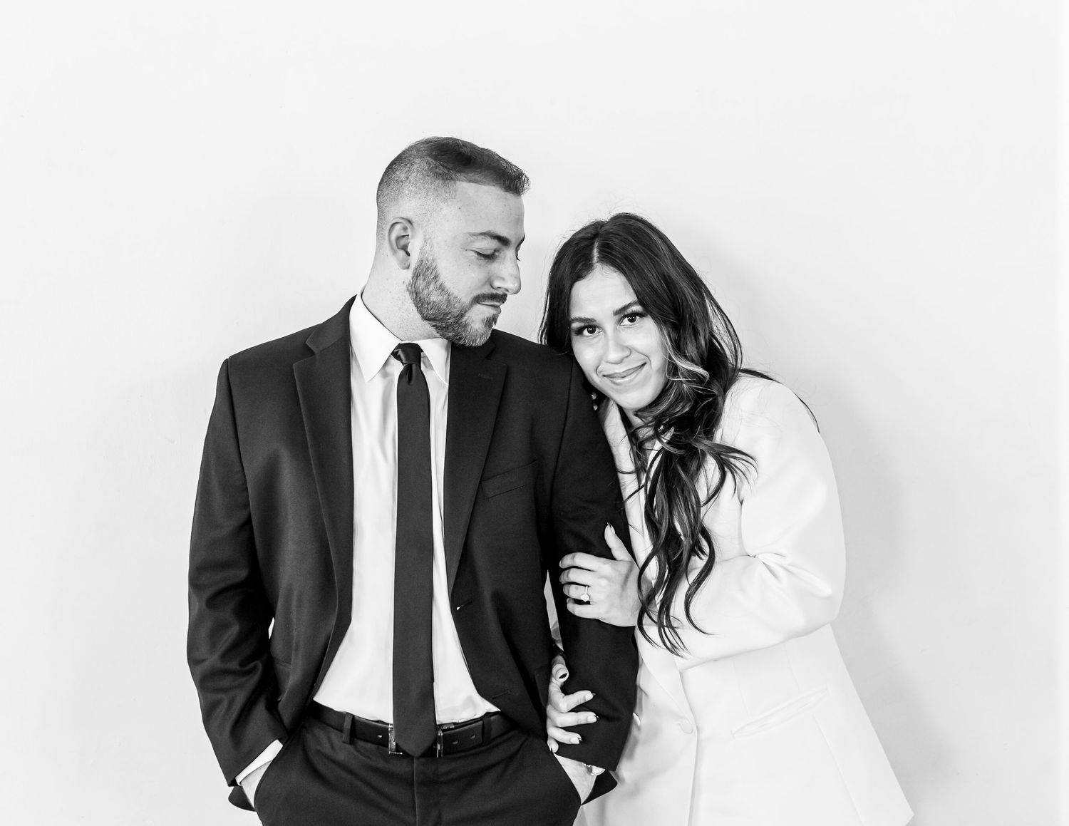 Engaged man and woman in Houston photography studio.