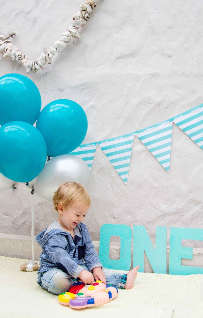 Baby boy celebrating first birthday party