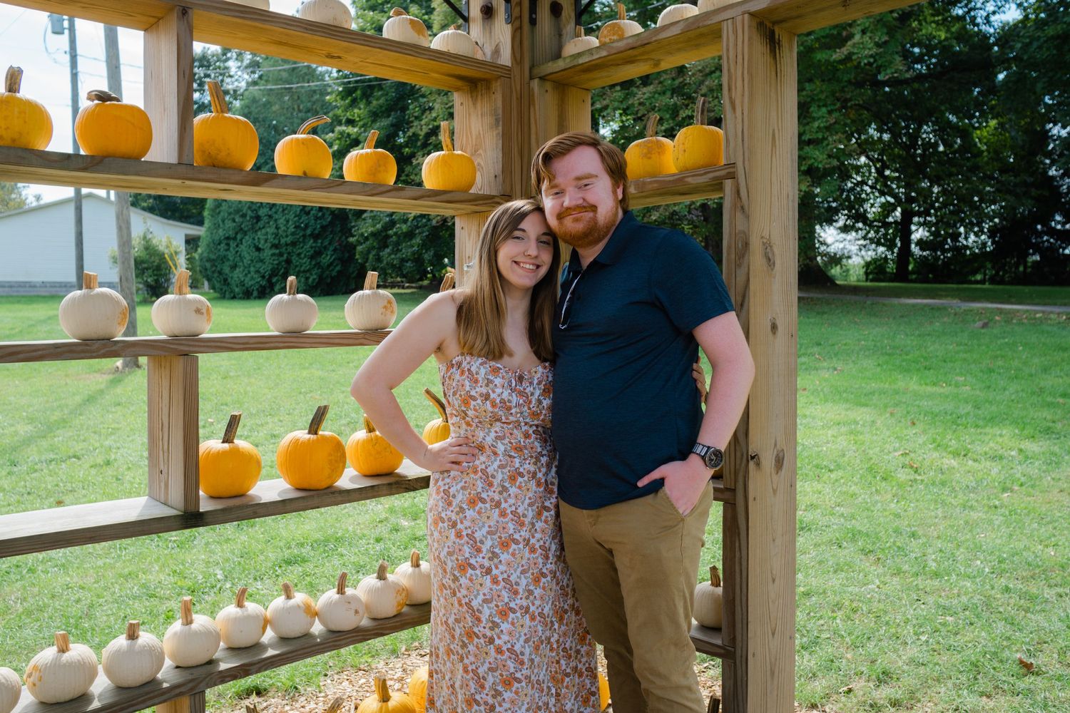 couple in pumpkin patch