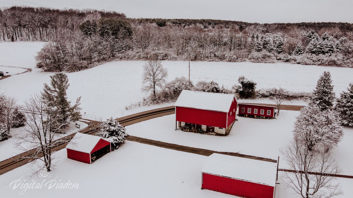 snowy barn aerial photo