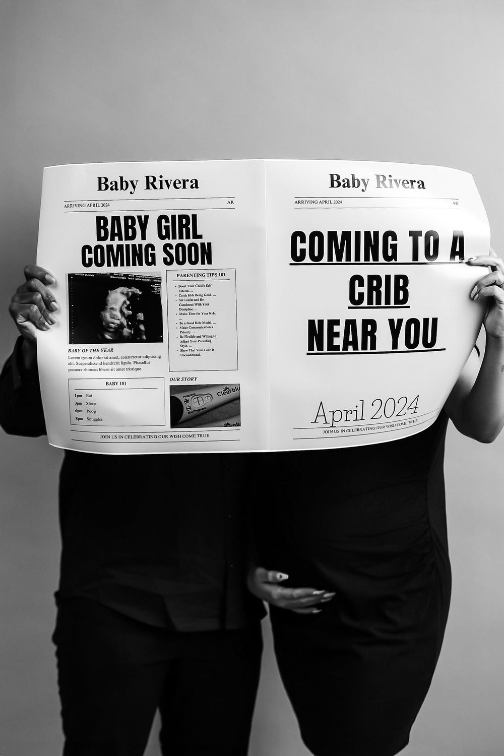 Creative pregnancy announcement with newspaper style posters revealing baby due in April 2024.