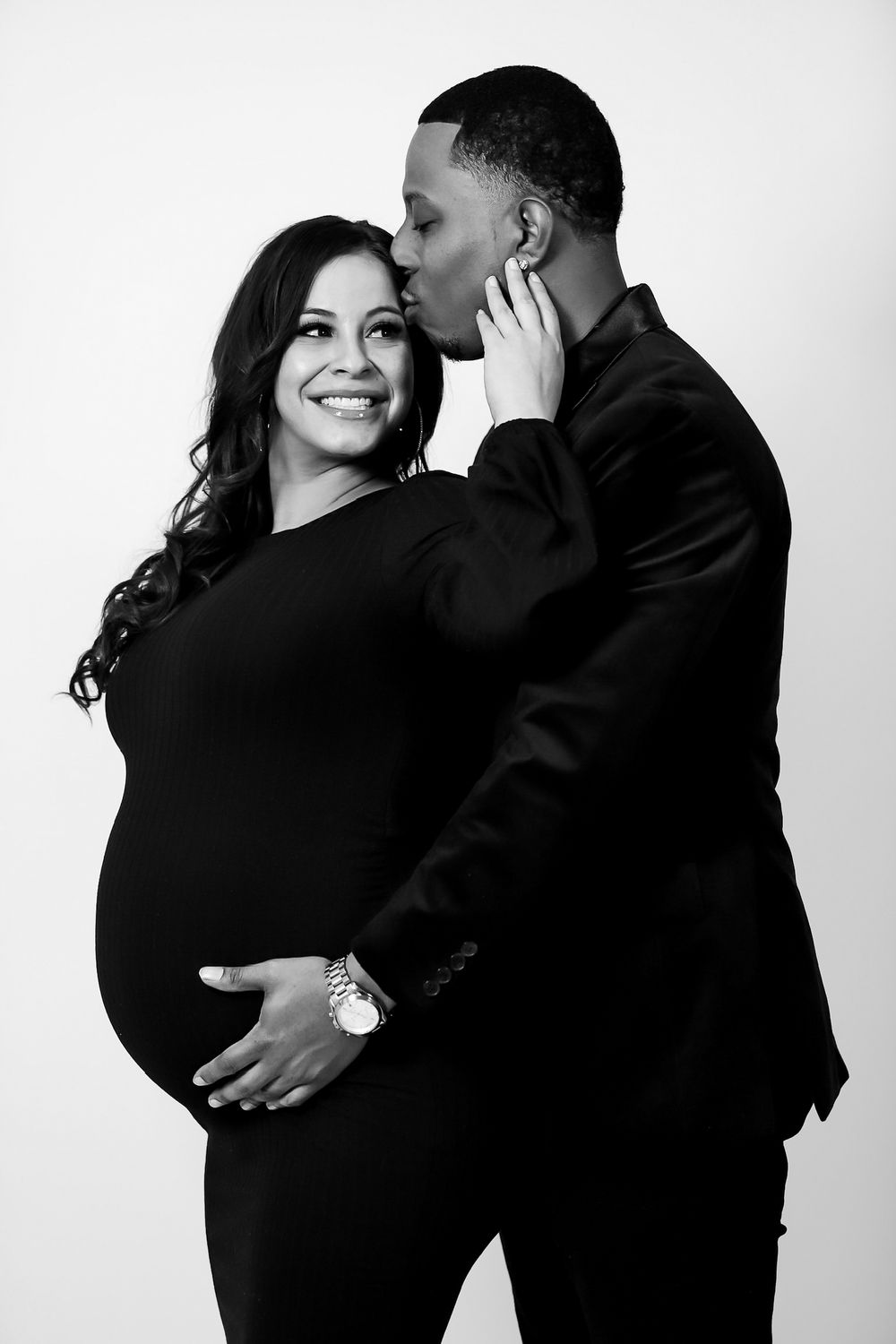 Black and white intimate couple portraits showing tender embraces and connection.