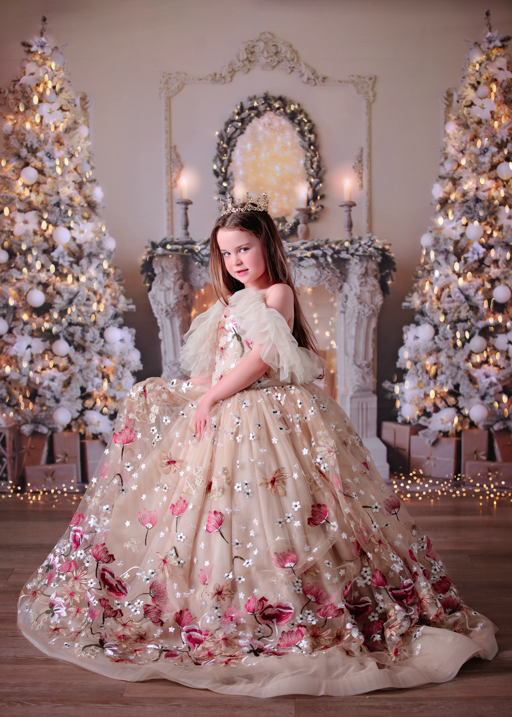 Christmas Dream Dress Session in studio, featuring gold styling and a girl in an embroidered gold and red couture gown.