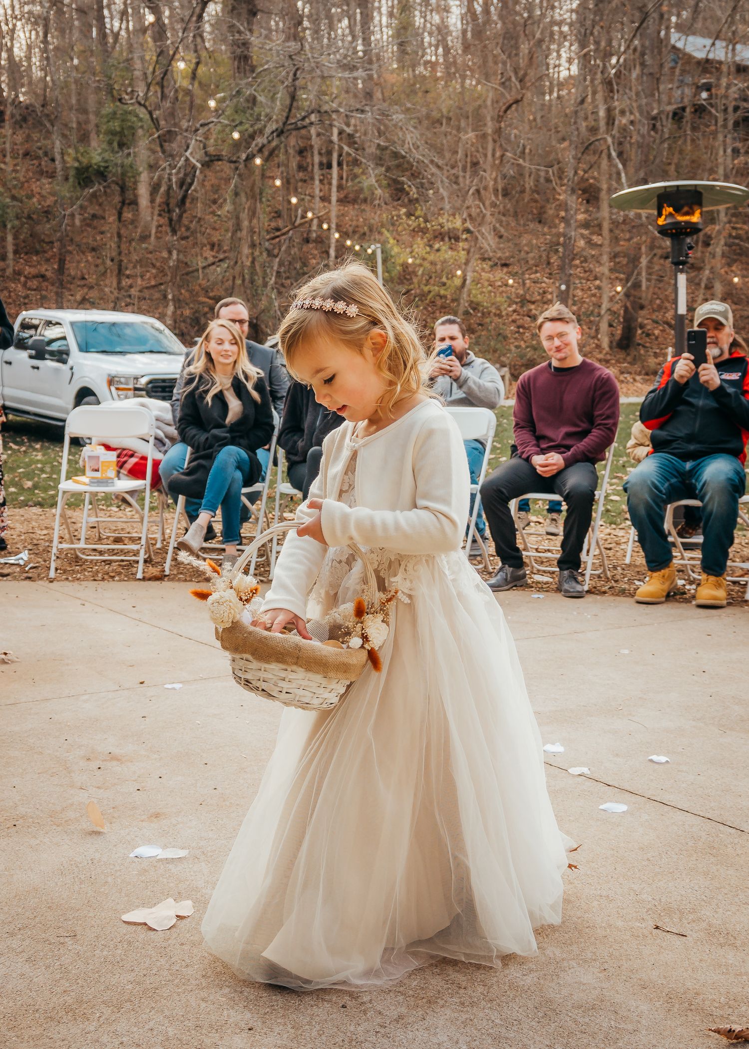 flower girl walking down the aisle