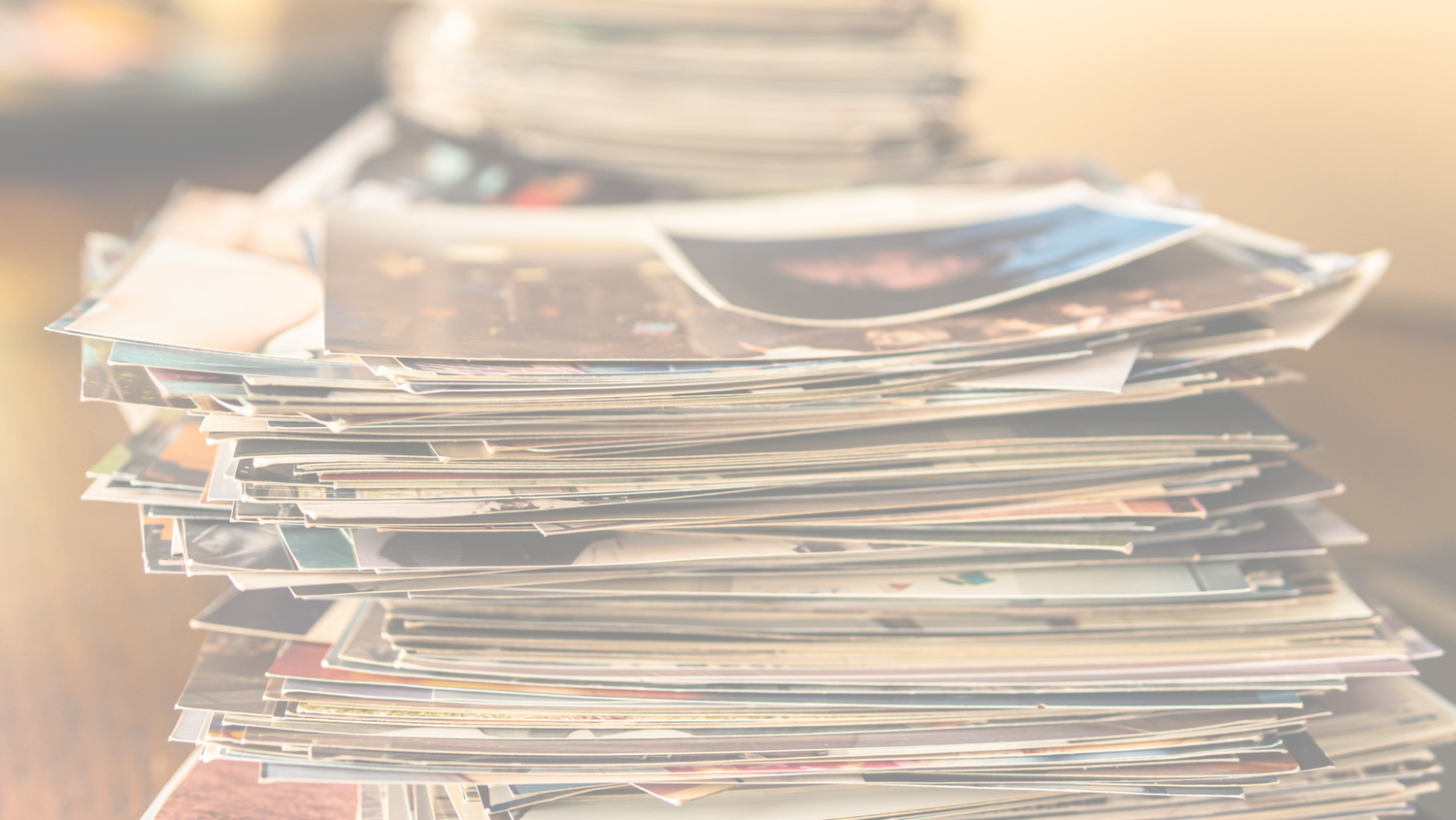 Stack of printed photos.