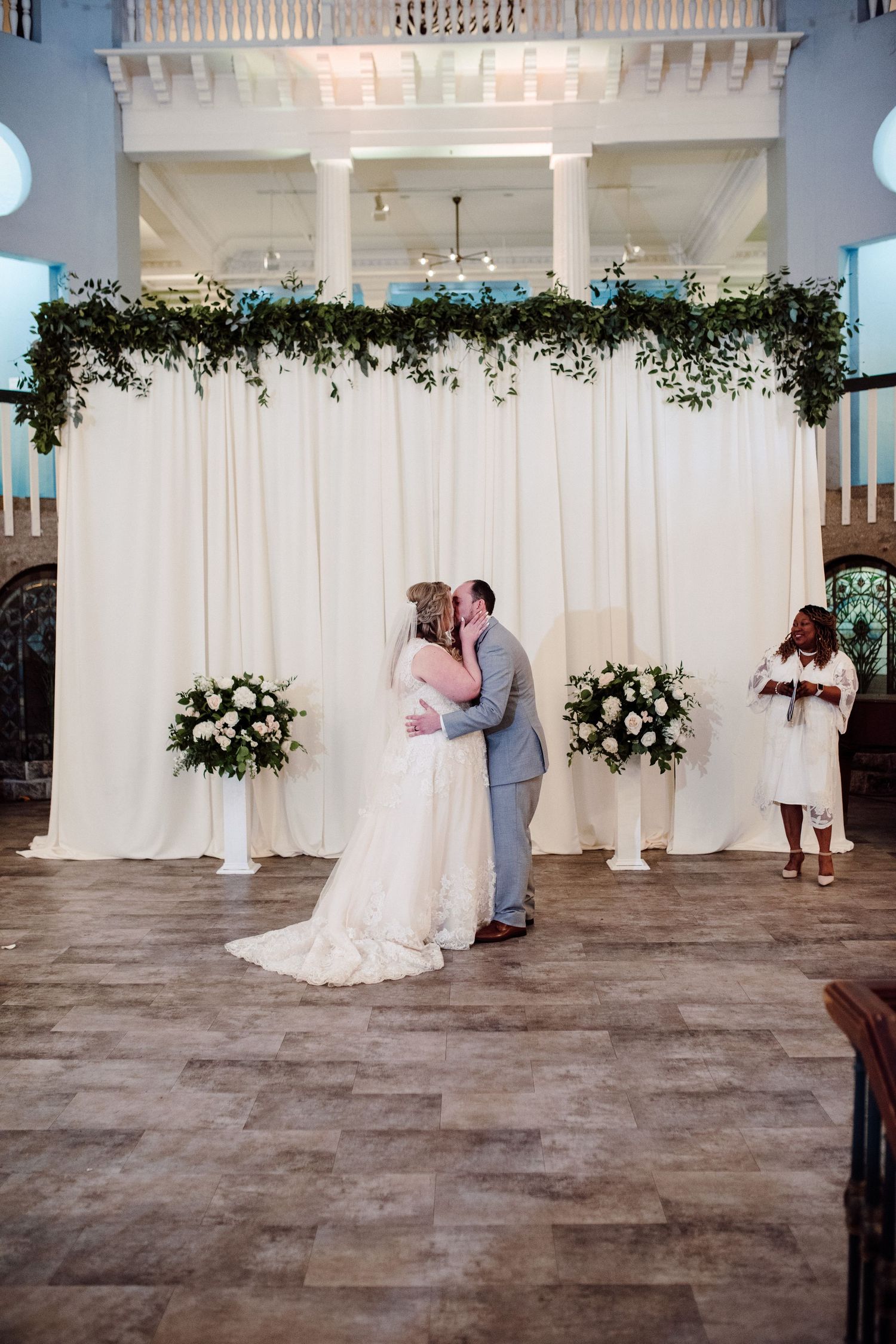 Bride and groom first kiss.