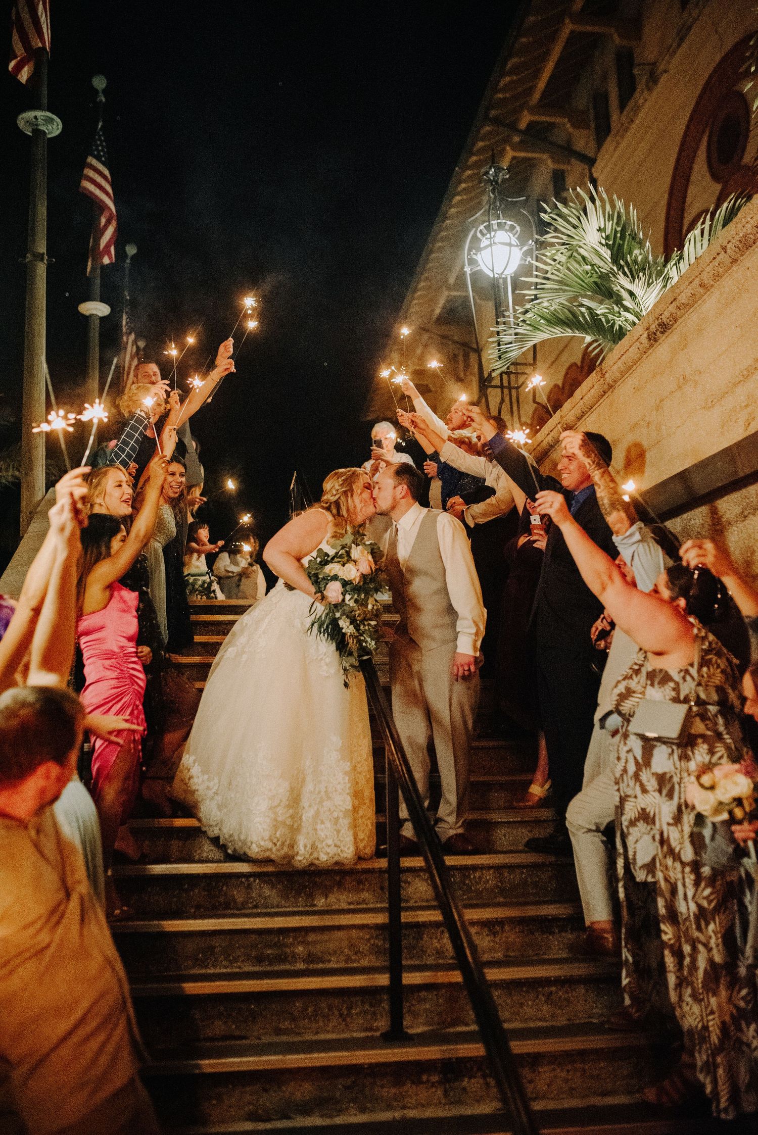 Bride and groom sparkler exit.