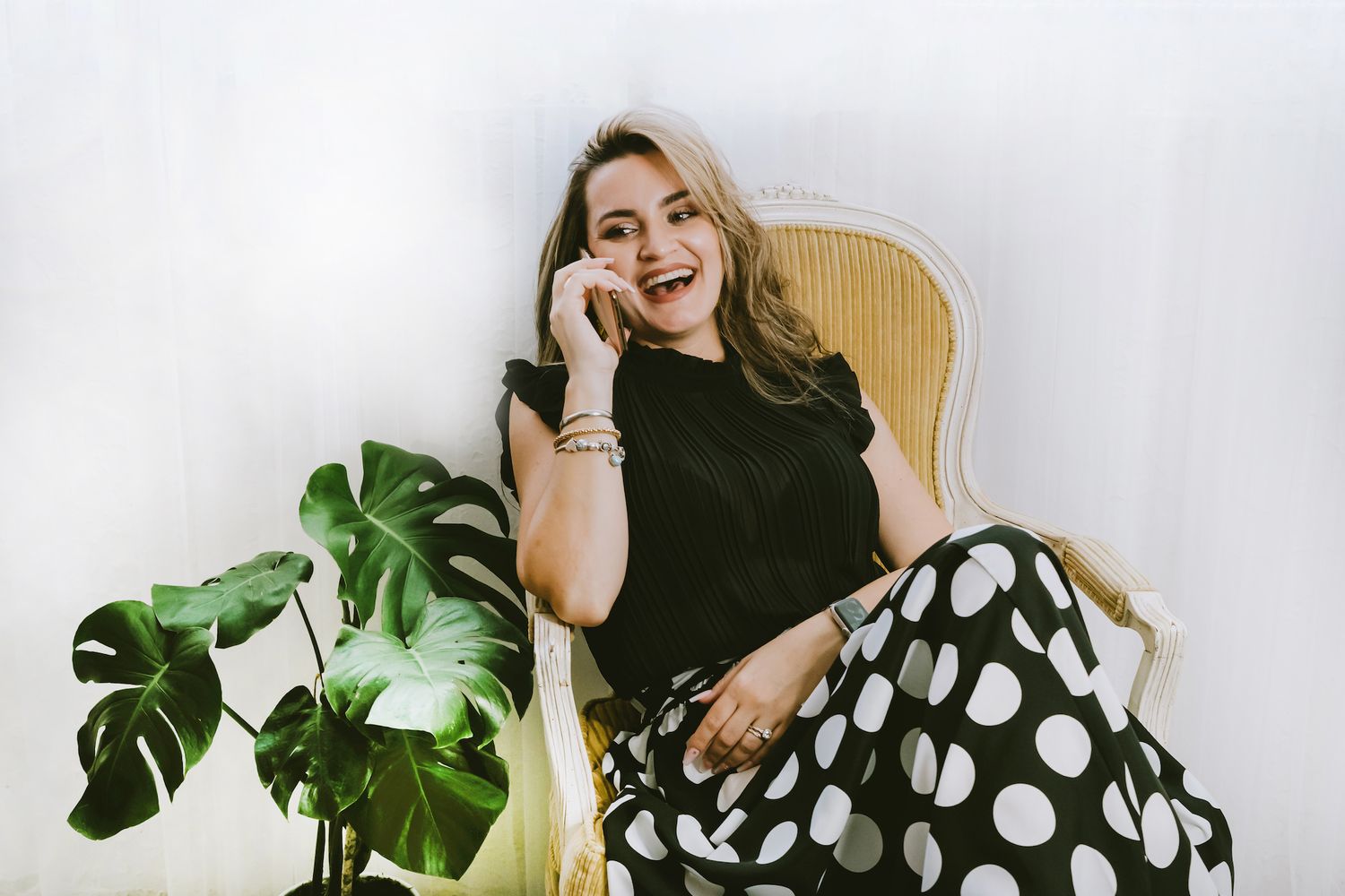 Realtor laughing talking on the phone