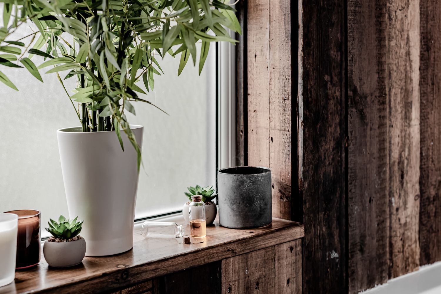 rustic farmhouse bathroom with plants and essential oils. high-end holiday let photos