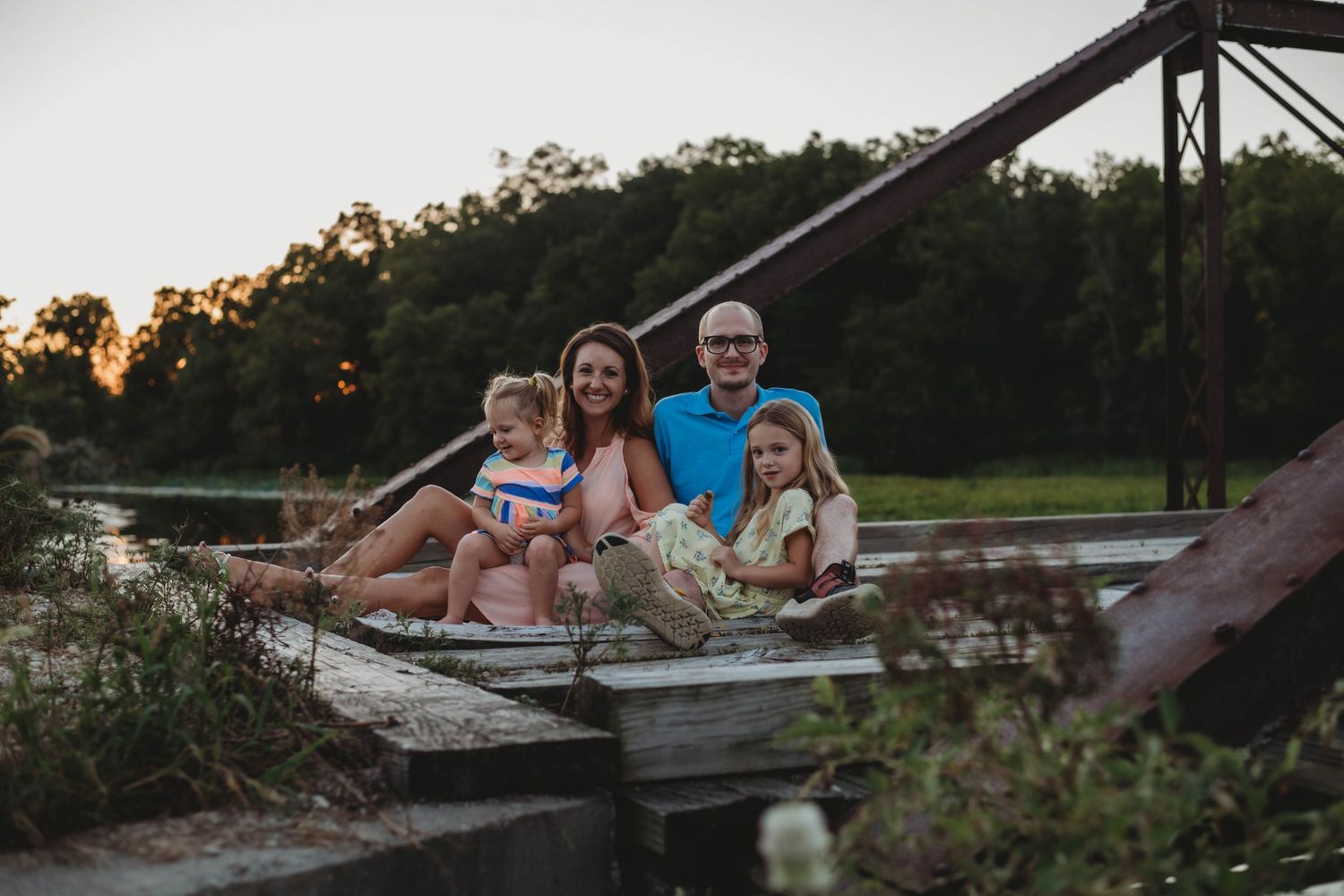 family photo, on bridge, golden hour