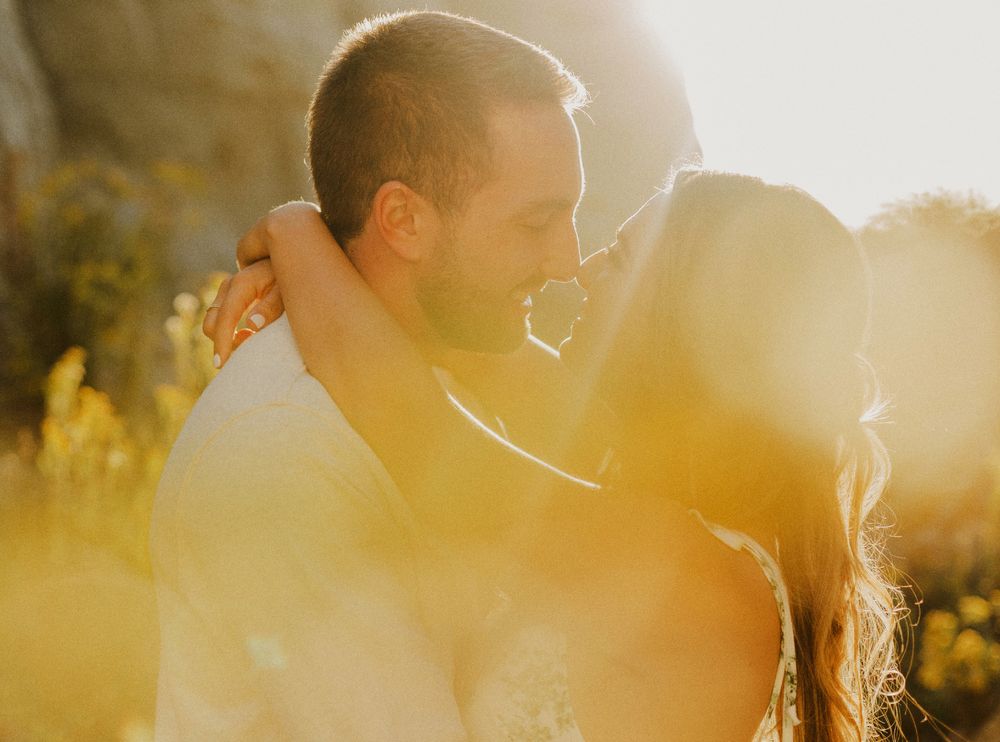 The perfect sun flare during a couple photography session in Southern California