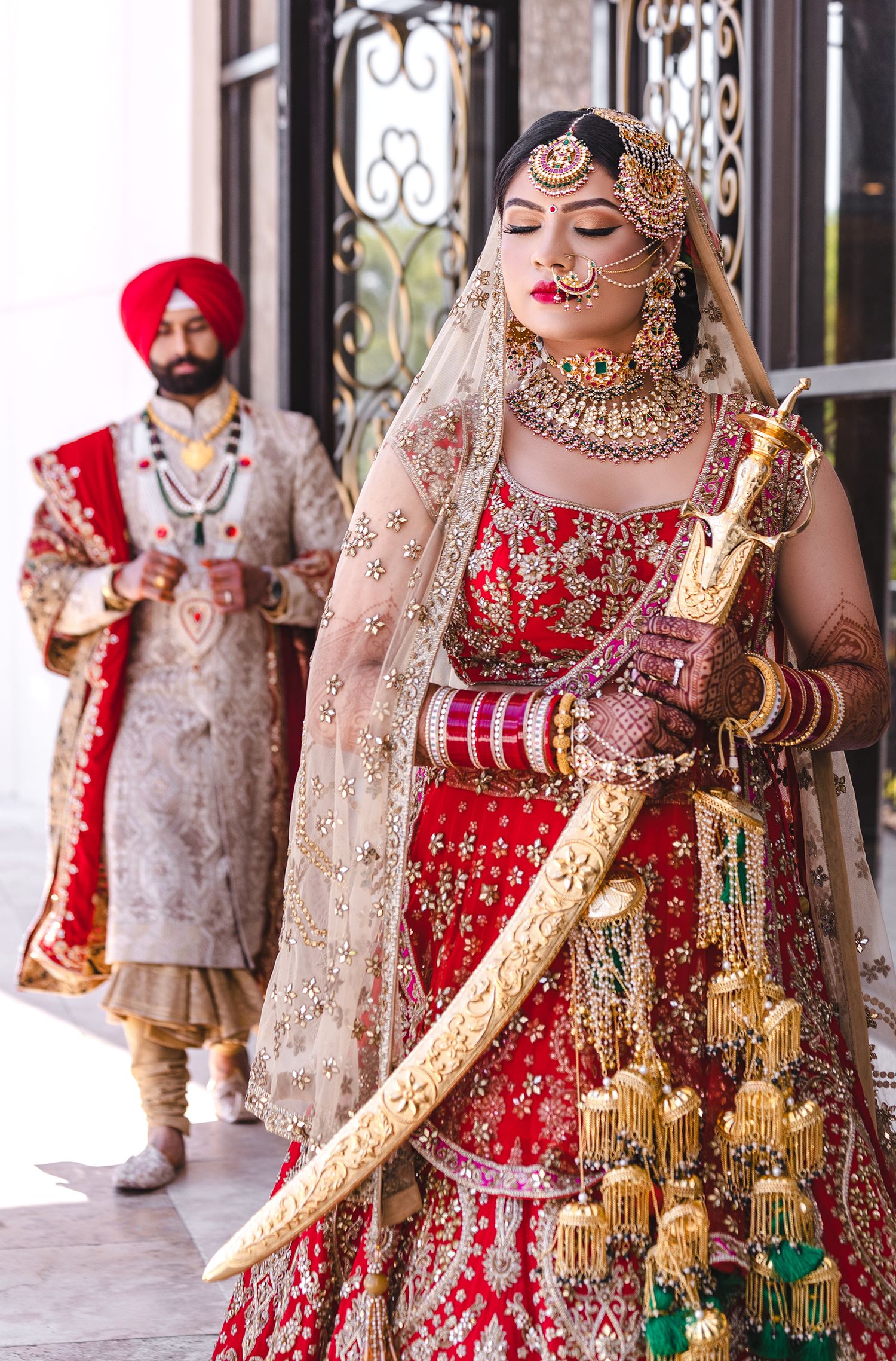 Indian Sikh Punjubi Wedding bride and groom dressed in red traditional attire first look Leonard's Palazzo