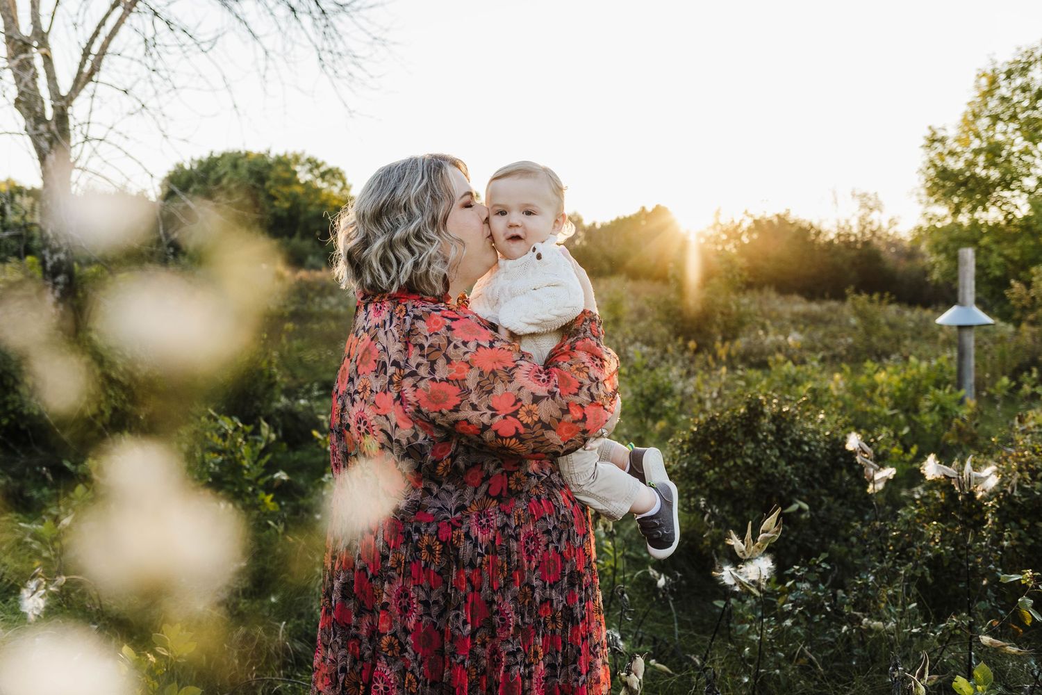 Mom and little boy snuggle up for dreamy golden hour photos with Oconomowoc, WI photographer.