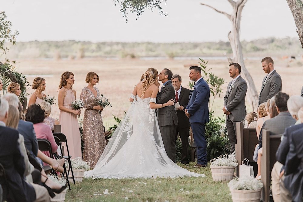 Rustic barn wedding in Myakka, Sarasota, Florida by Tampa and New England Wedding Photographer